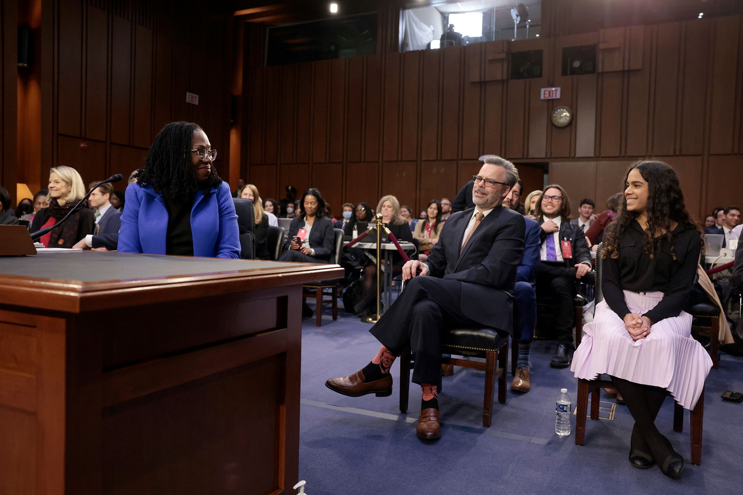 Judge Ketanji Brown Jackson's husband, Patrick Jackson, and daughter, Leila Jackson, smiling while seated behind her at the close of Jackson's third day of confirmation hearings on March 23. (Anna Moneymaker—Getty Images)