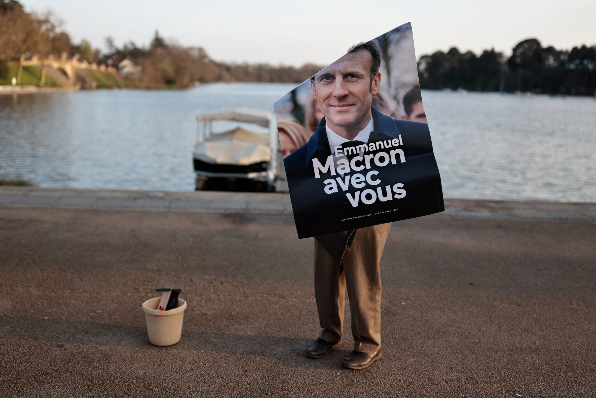 A campaign poster showing President Macron on March 22 (Jeremias Gonzalez—AP)