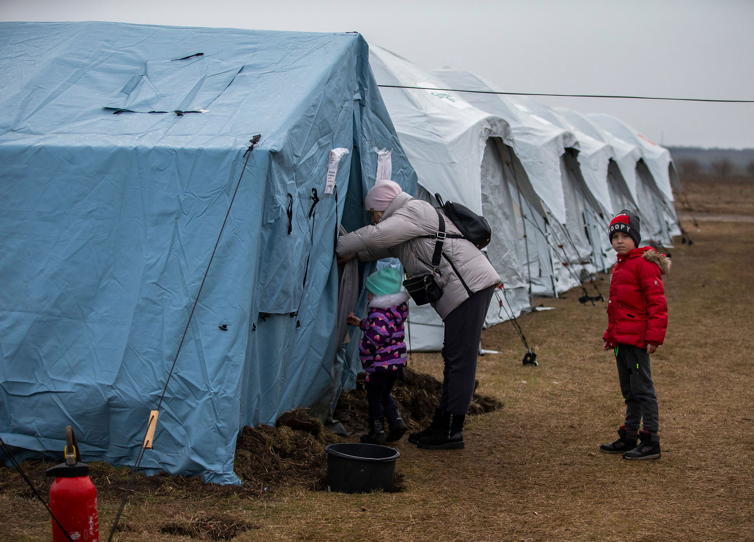 People fleeing Ukraine arrive at a refugee camp near Palanca Village, some three kilometers from the Moldova-Ukraine border, on March 7, 2022 (Dumitru Doru—EPA-EFE/Shutterstock)