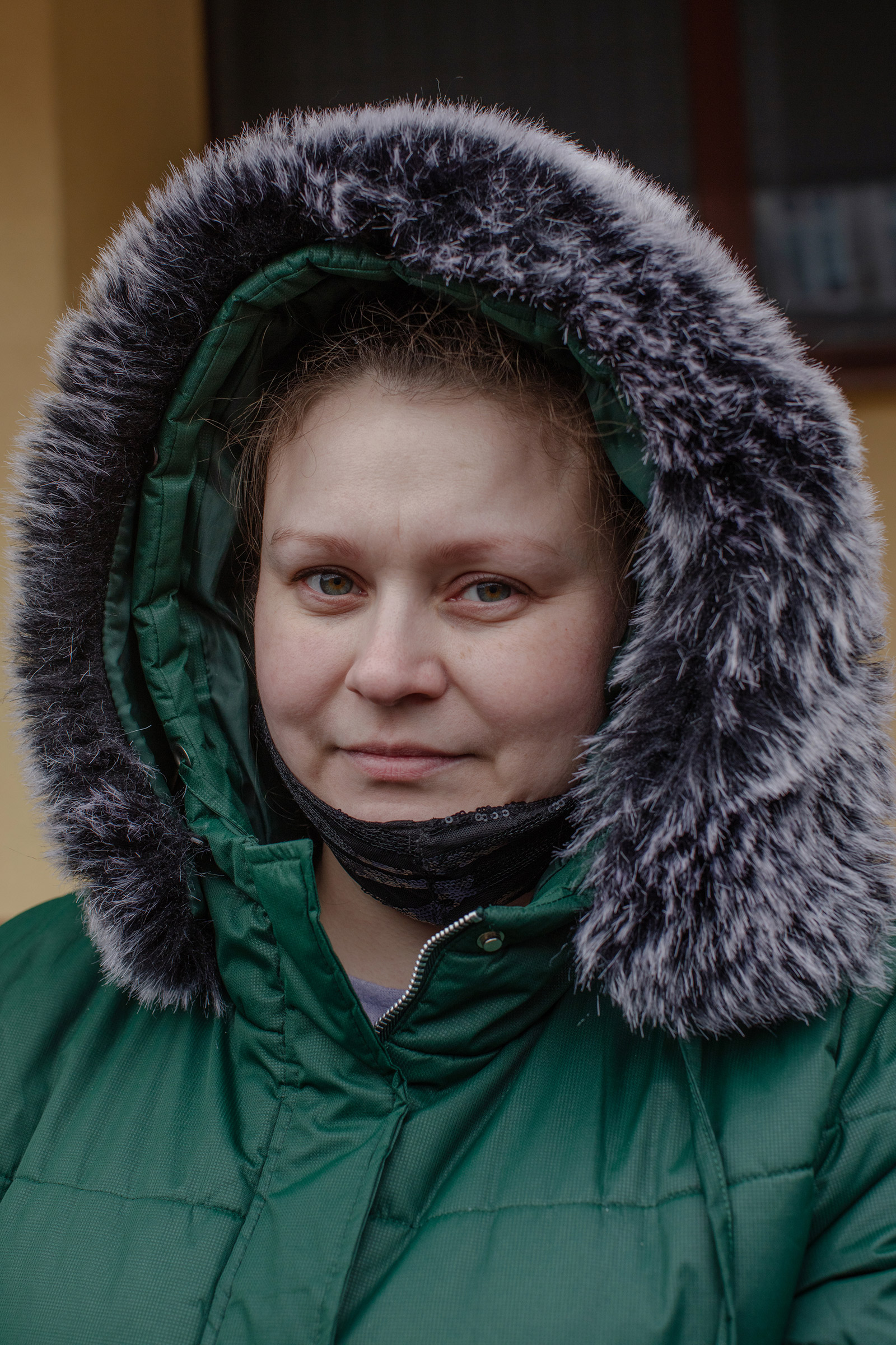 Abramosova, 35, at the train station in Przemysl, Poland. She works in an Amazon warehouse in Poland, sending money back home (Natalie Keyssar for TIME)
