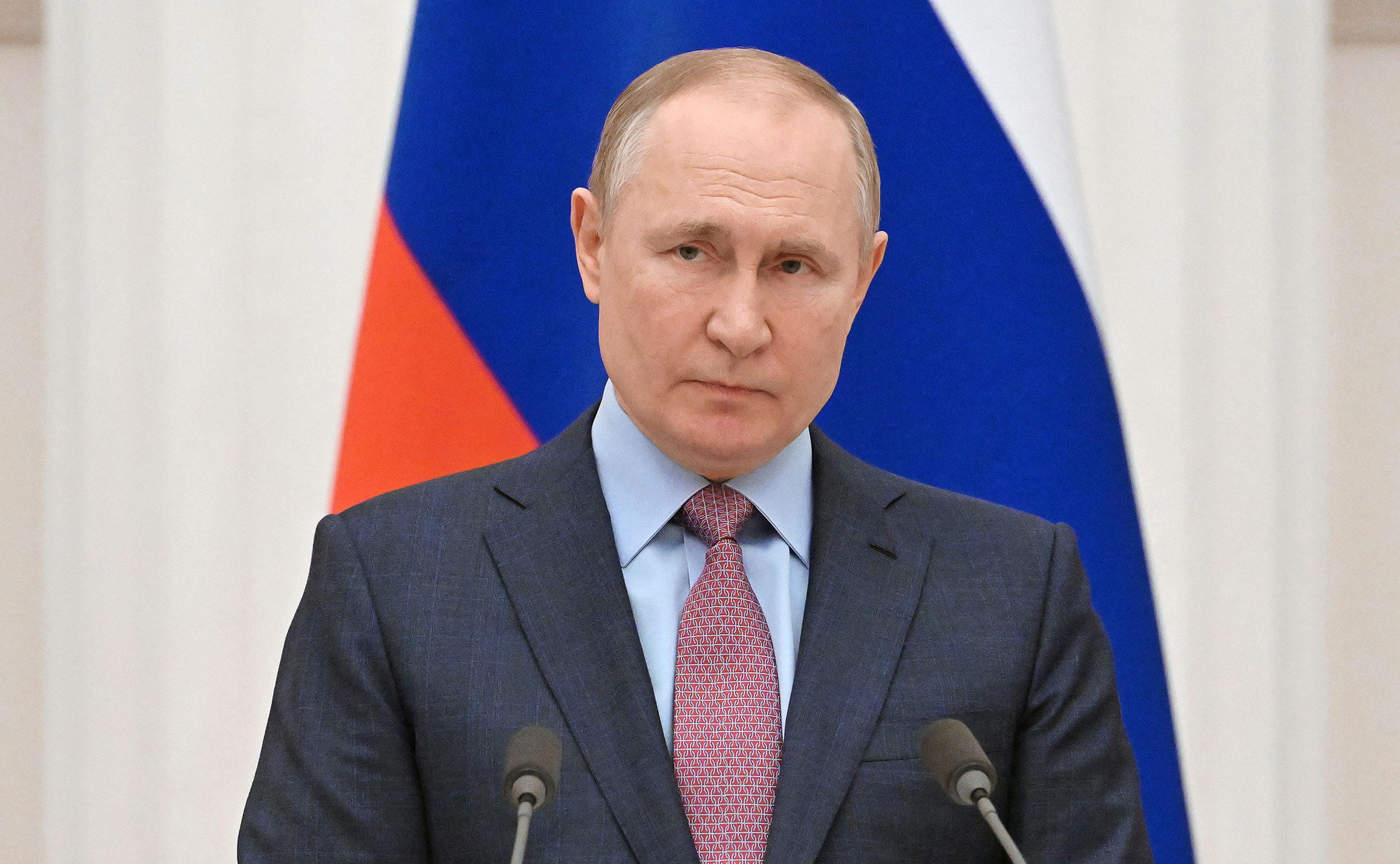 President Vladimir Putin attends a press conference at the Kremlin in Moscow on Feb. 18, 2022.
