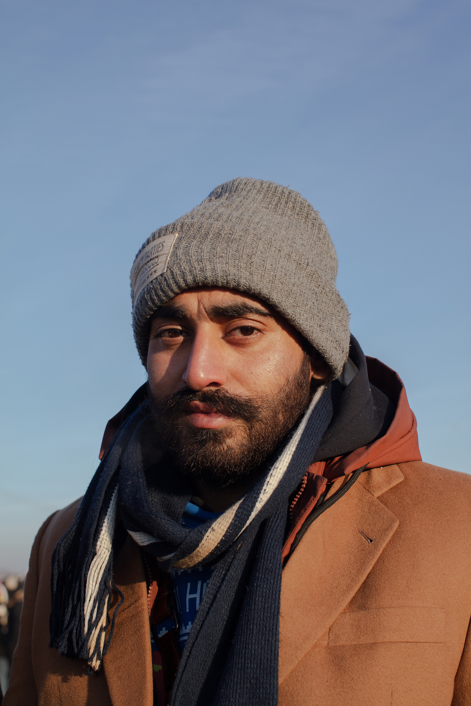 Parvinder Singh from India said he spent three days waiting to cross the border without food, water, or sleep, while white Ukrainians passed through much more quickly (Natalie Keyssar for TIME)