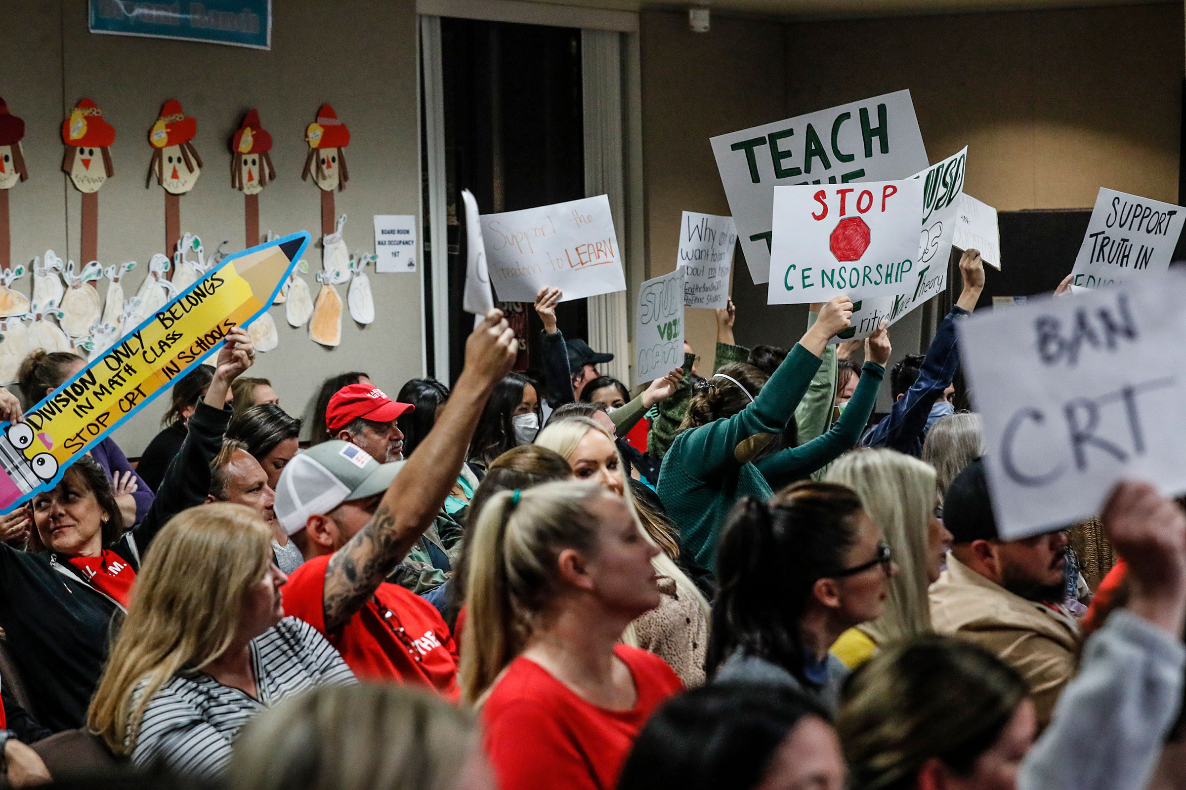 A mix of proponents and opponents to teaching Critical Race Theory are in attendance as the Placentia Yorba Linda School Board discusses a proposed resolution to ban it from being taught in schools in Yorba Linda, Calif. on Nov. 16, 2021. (Robert Gauthier—Los Angeles Times/Getty Images)