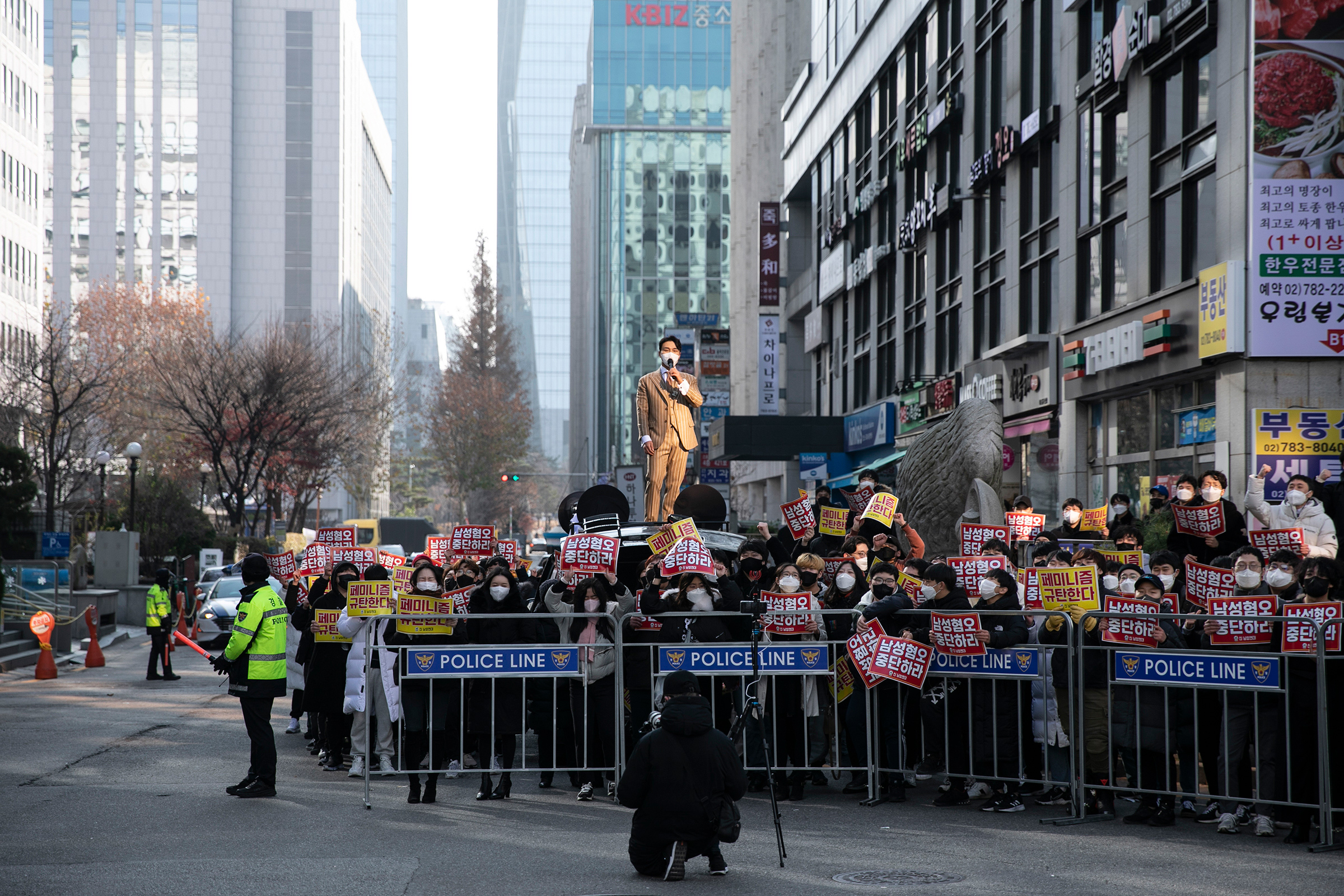 Bae In-kyu, head of "Man on Solidarity," one of South Korea's most active anti-feminist groups, leads a rally in Seoul in December 2021. "Feminists are a social evil," he has said. (Woohae Cho—The New York Times/Redux)