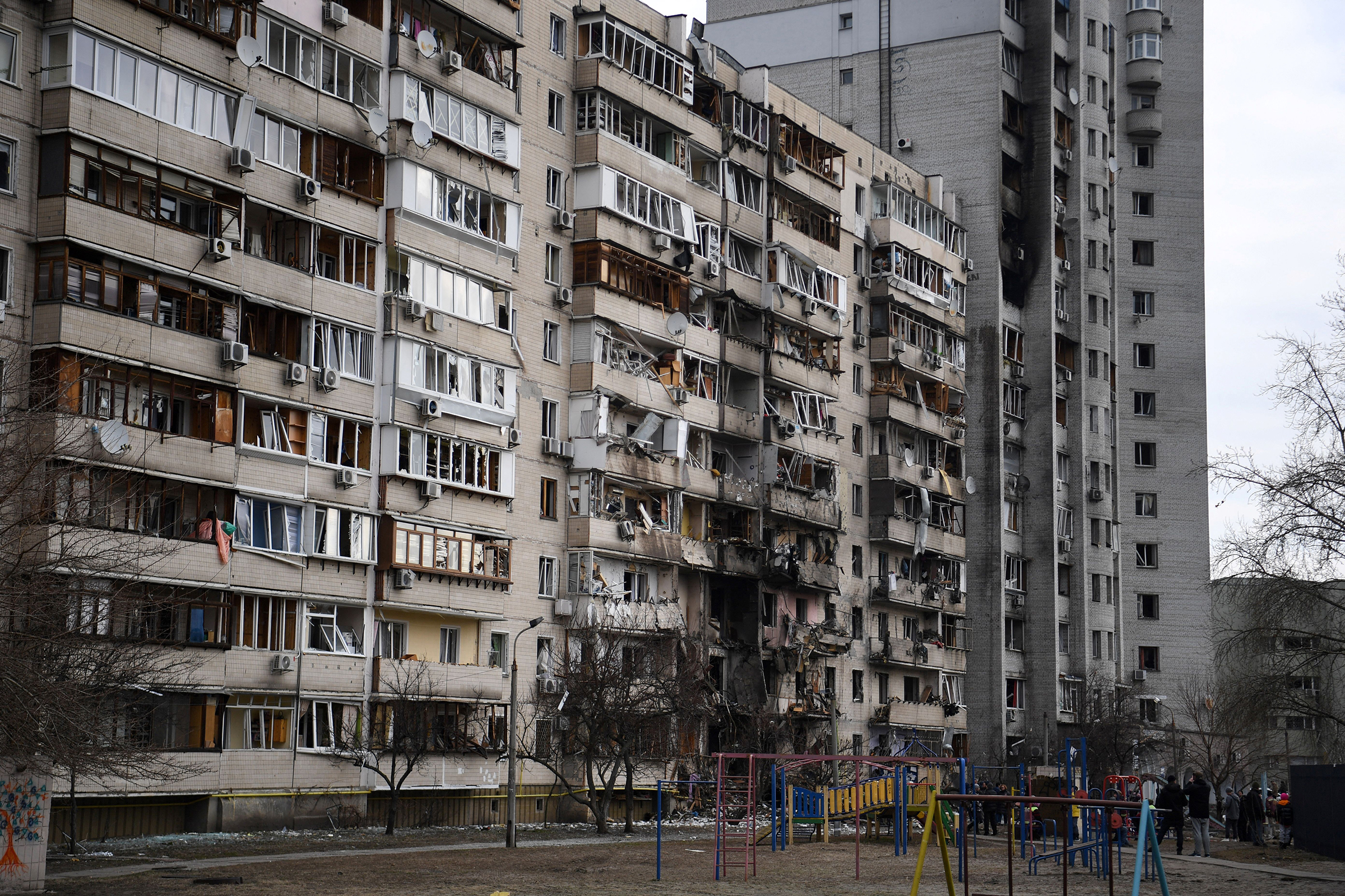 A general view of a damaged residential building at Koshytsa Street, a suburb of the Ukrainian capital Kyiv, where a military shell allegedly hit, on February 25, 2022. (Daniel Leal—AFP/Getty Images)