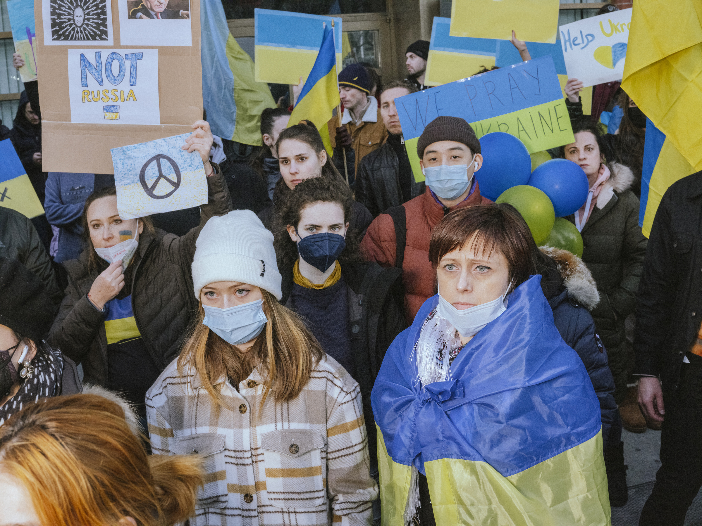 Demonstrators during a protest against the Russian invasion of Ukraine in front of the United Nations Headquarters in New York City on Feb. 27 (Ismail Ferdous—Bloomberg/Getty Images)