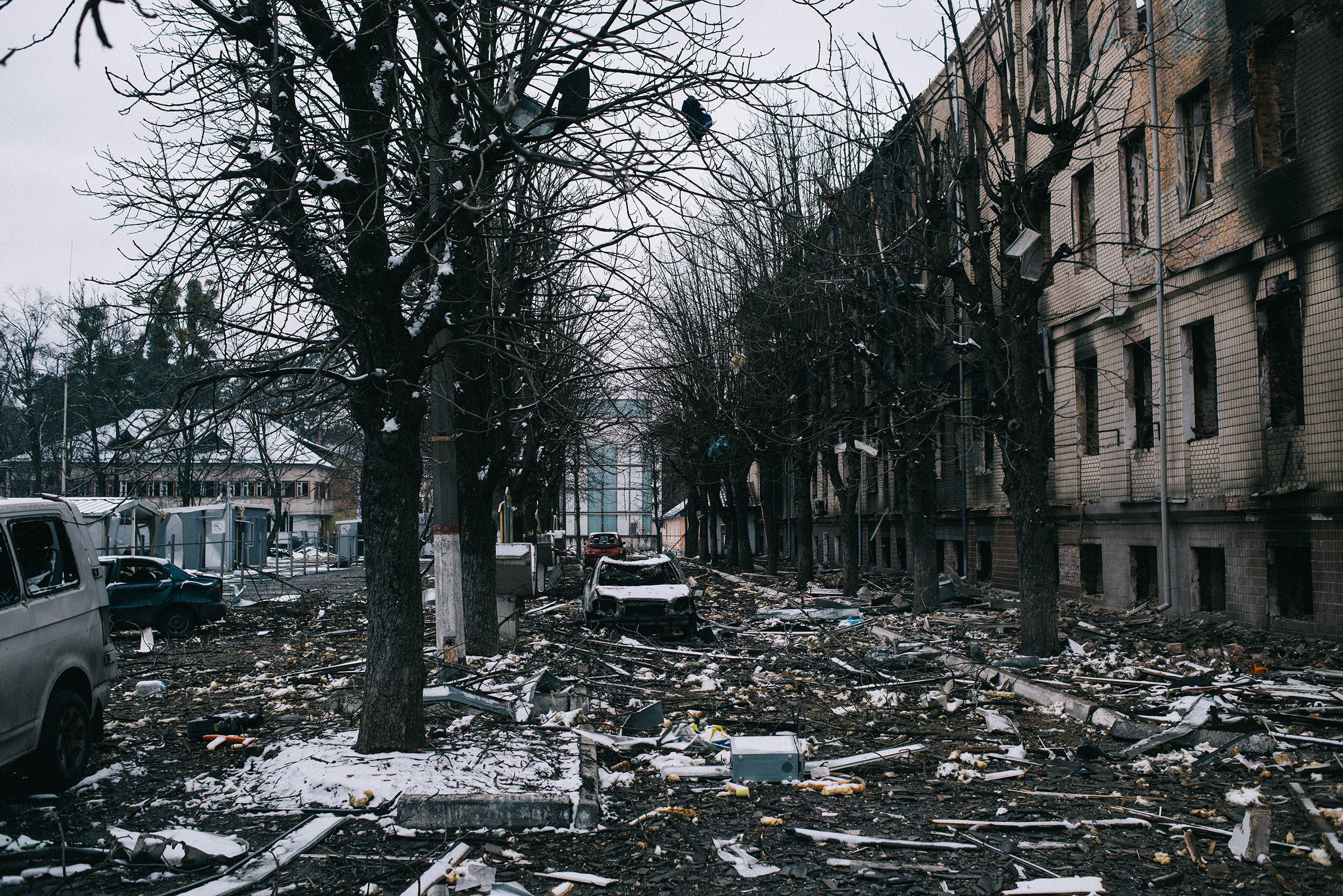 Debris litters the streets of Brovary on March 1, days after a deadly Russian rocket attack on Ukrainian military units left vehicles and buildings gutted and destroyed (Maxim Dondyuk)