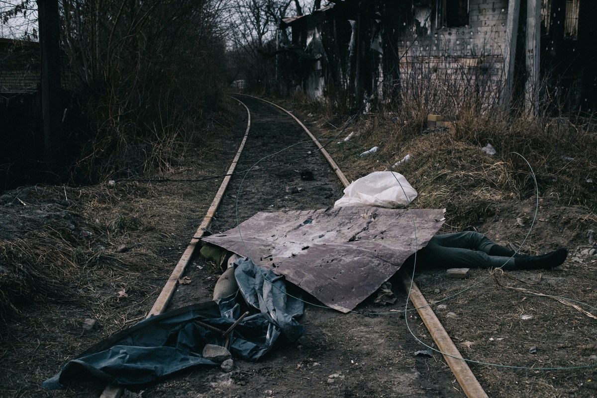 A Russian soldier lies dead on a railroad track in Irpin, northwest of Kyiv, on Marchâ€¯12. Ukrainian forces have repelled wave after wave of Russian attacks on the town, a gateway to the capital