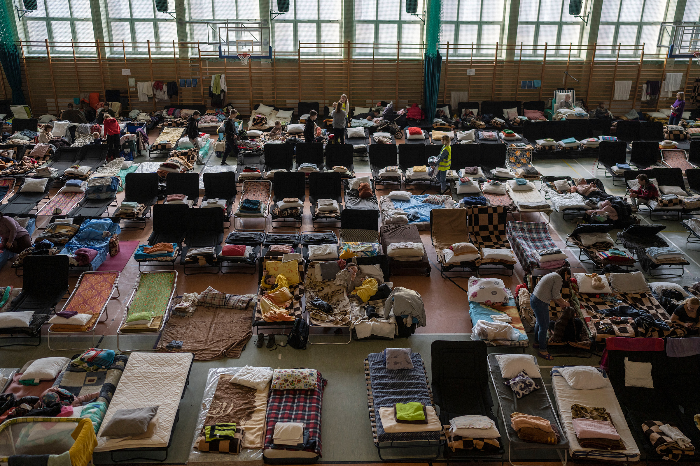 An indoor sports stadium being used as a refugee center, Medyka village, a border crossing between Poland and Ukraine, March 15 (Petros Giannakouris—AP)