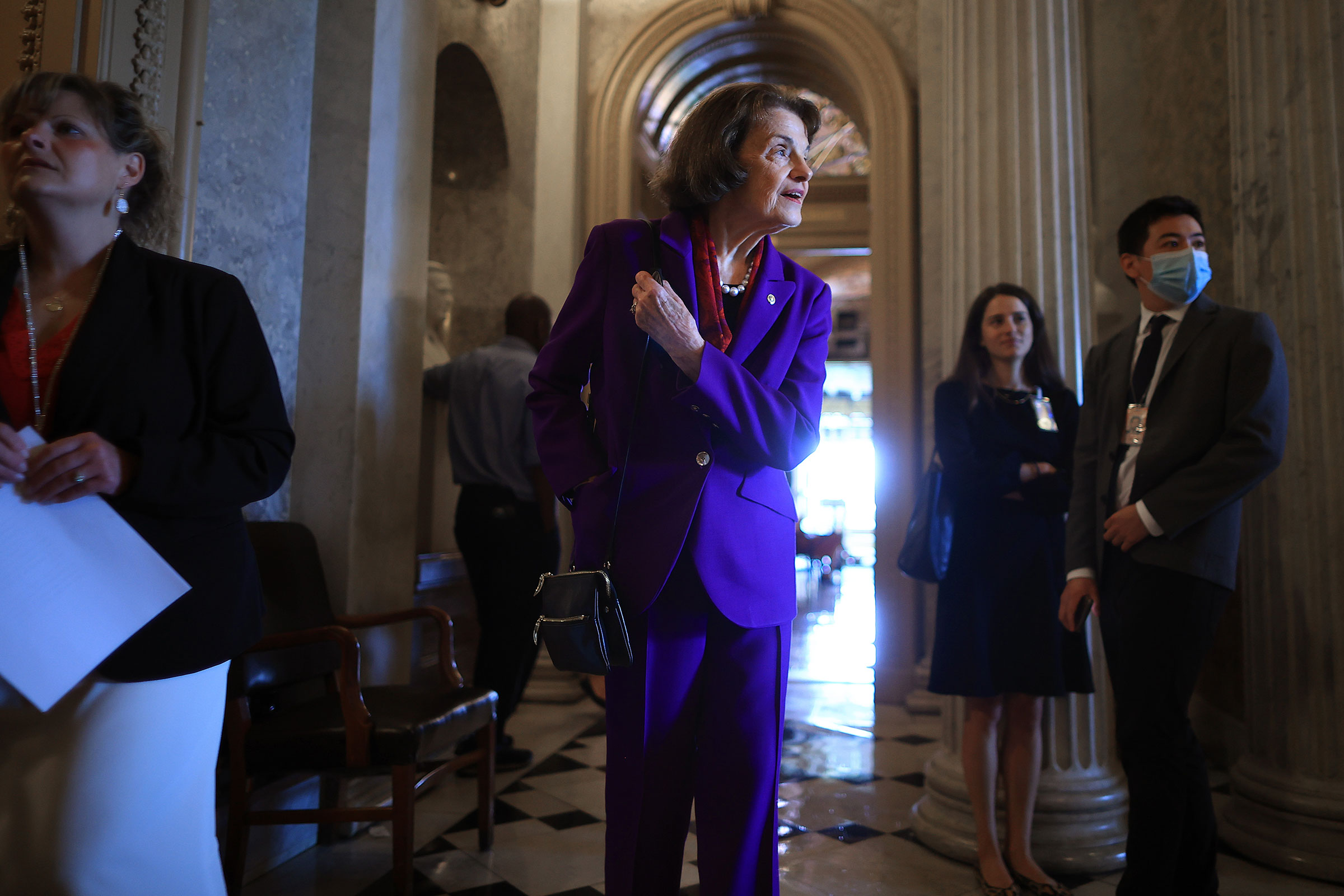 Sen. Dianne Feinstein steps out of the Senate Chamber after voting at the U.S. Capitol on July 21, 2021. (Chip Somodevilla—Getty Images)