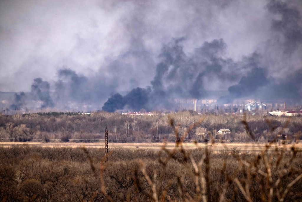 Smoke rises over the town of Rubizhne, Donbas region, on April 7, 2022, amid Russia's military invasion launched on Ukraine. (Fadel Senna—AFP/Getty Images)