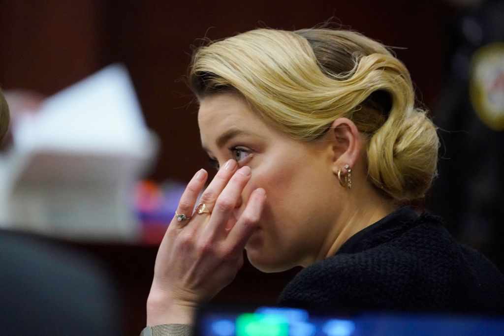 Actor Amber Heard listens in the courtroom at the Fairfax County Circuit Courthouse in Fairfax, Virginia, April 25, 2022. (Steve Helber—Getty Images)