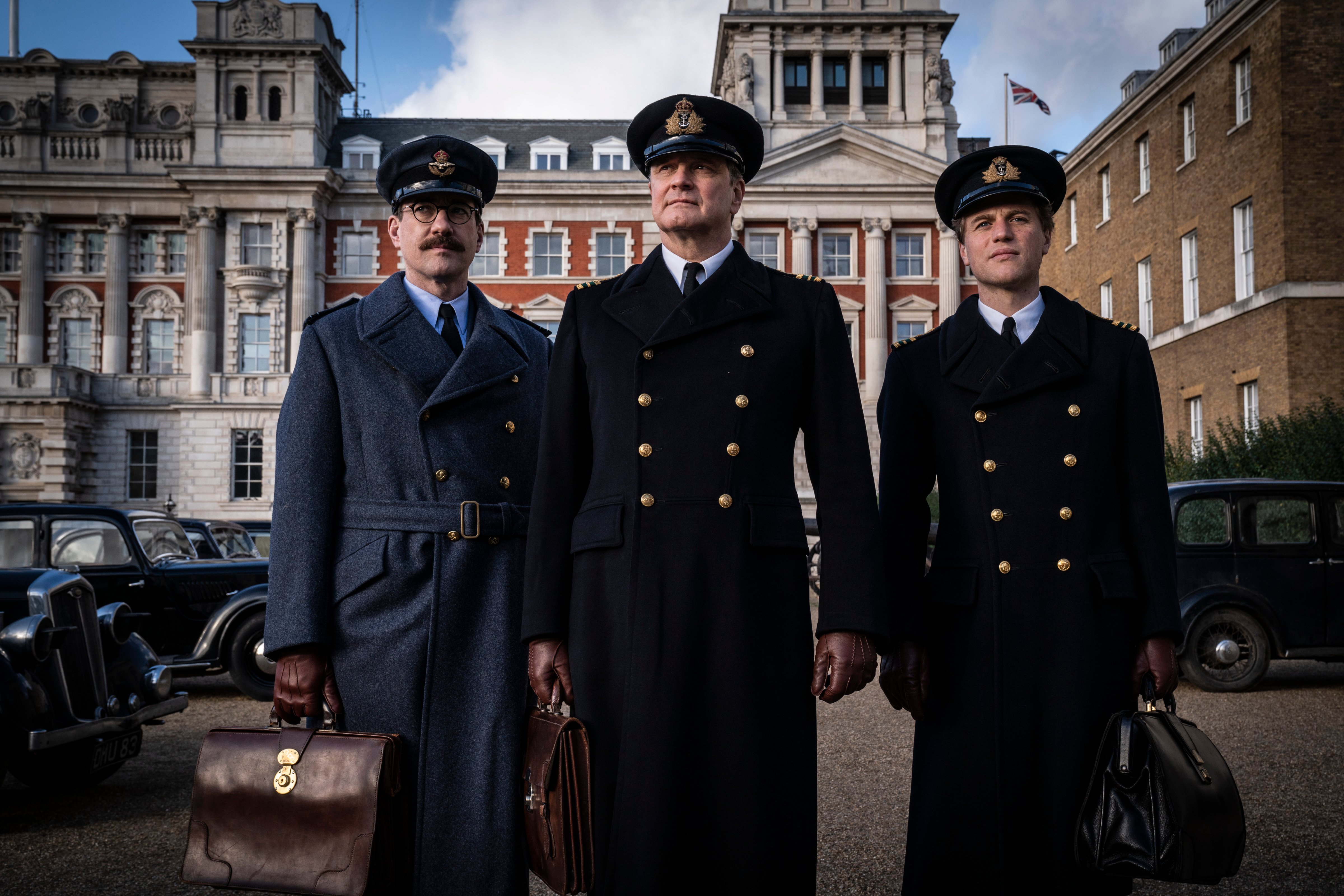 OPERATION MINCEMEAT (2022) Matthew Macfadyen as Charles Cholmondeley, Colin Firth as Ewen Montagu and Johnny Flynn as Ian Fleming. Cr: Giles Keyte/See-Saw Films, Courtesy of Netflix (Giles Keyte/See-Saw Films, Courtesy of Netflix—Haversack Films Limited)