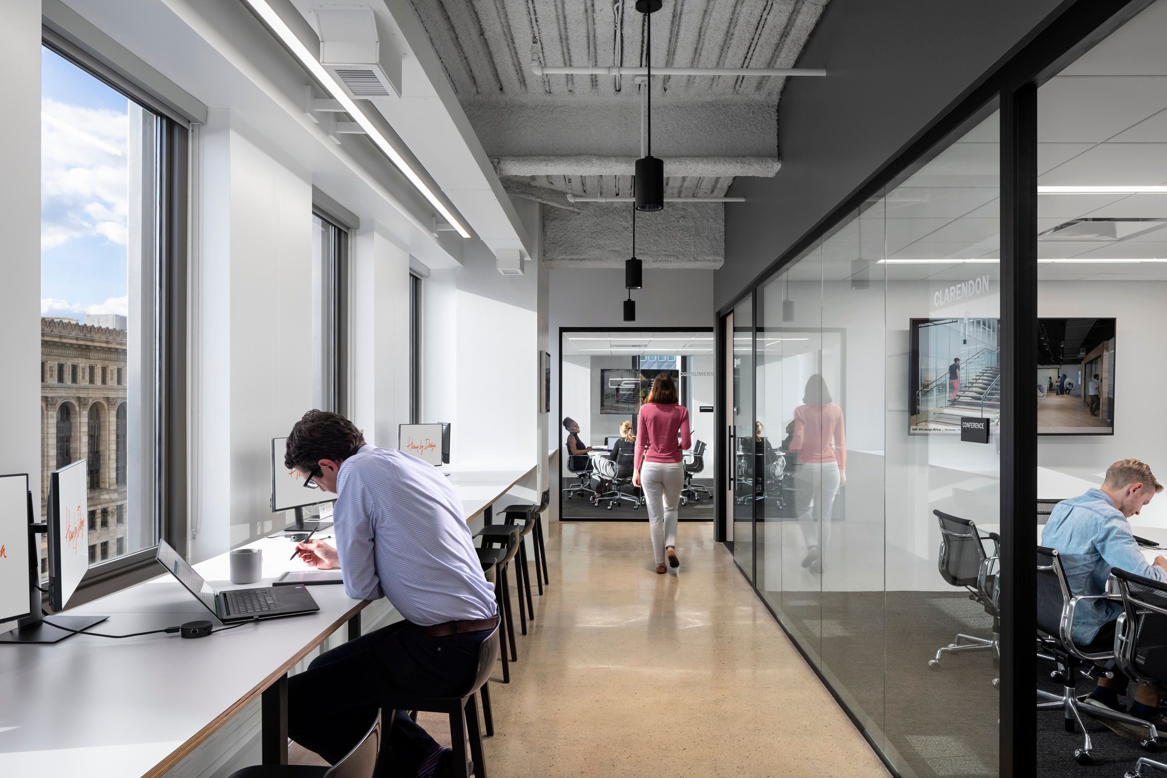 The new studio increased its “we-space,” which includes both meeting rooms and more informal meeting spaces. (Andrew Rugge / Courtesy Perkins Eastman)