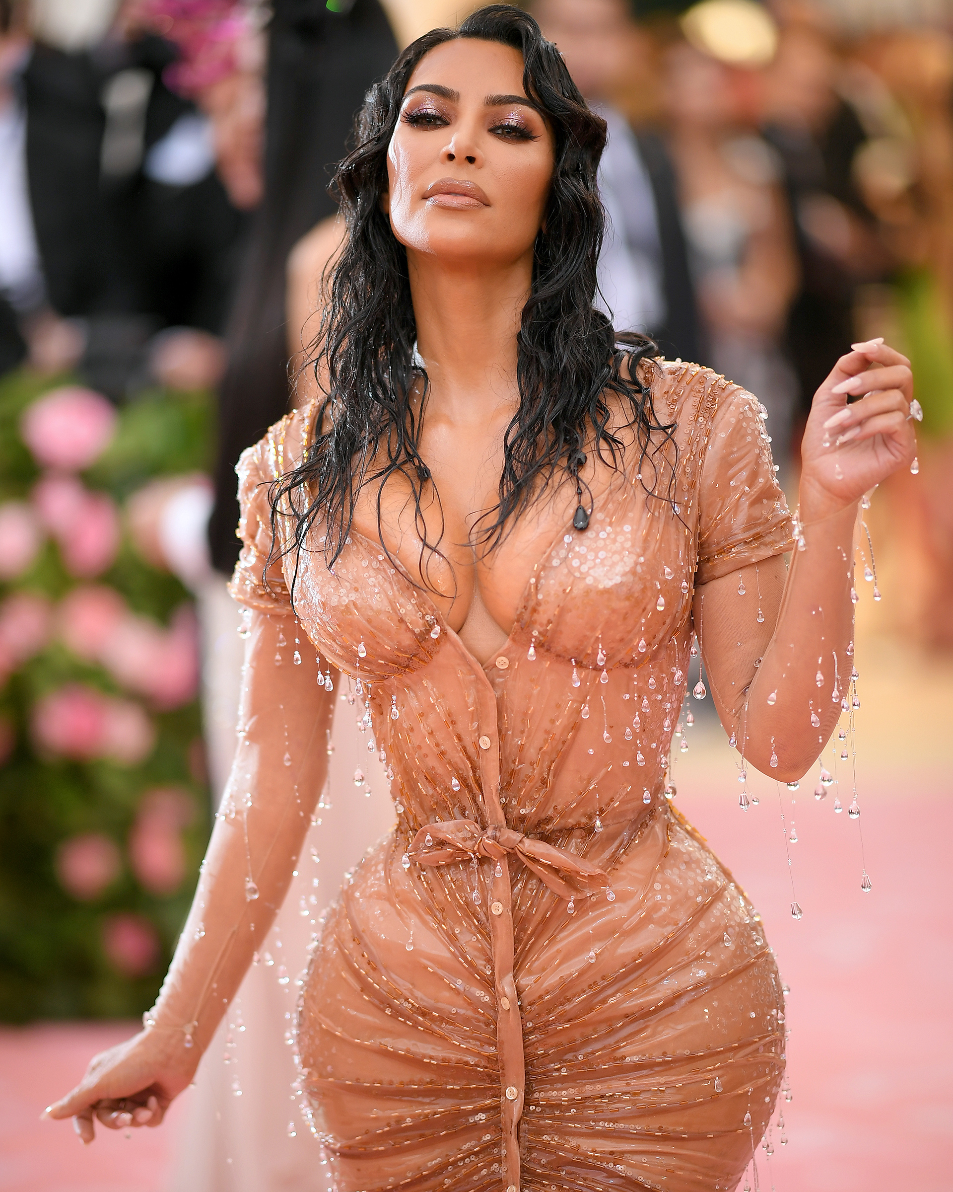 Kim Kardashian West, wearing a custom latex Thierry Mugler dress, attends the 2019 Met Gala