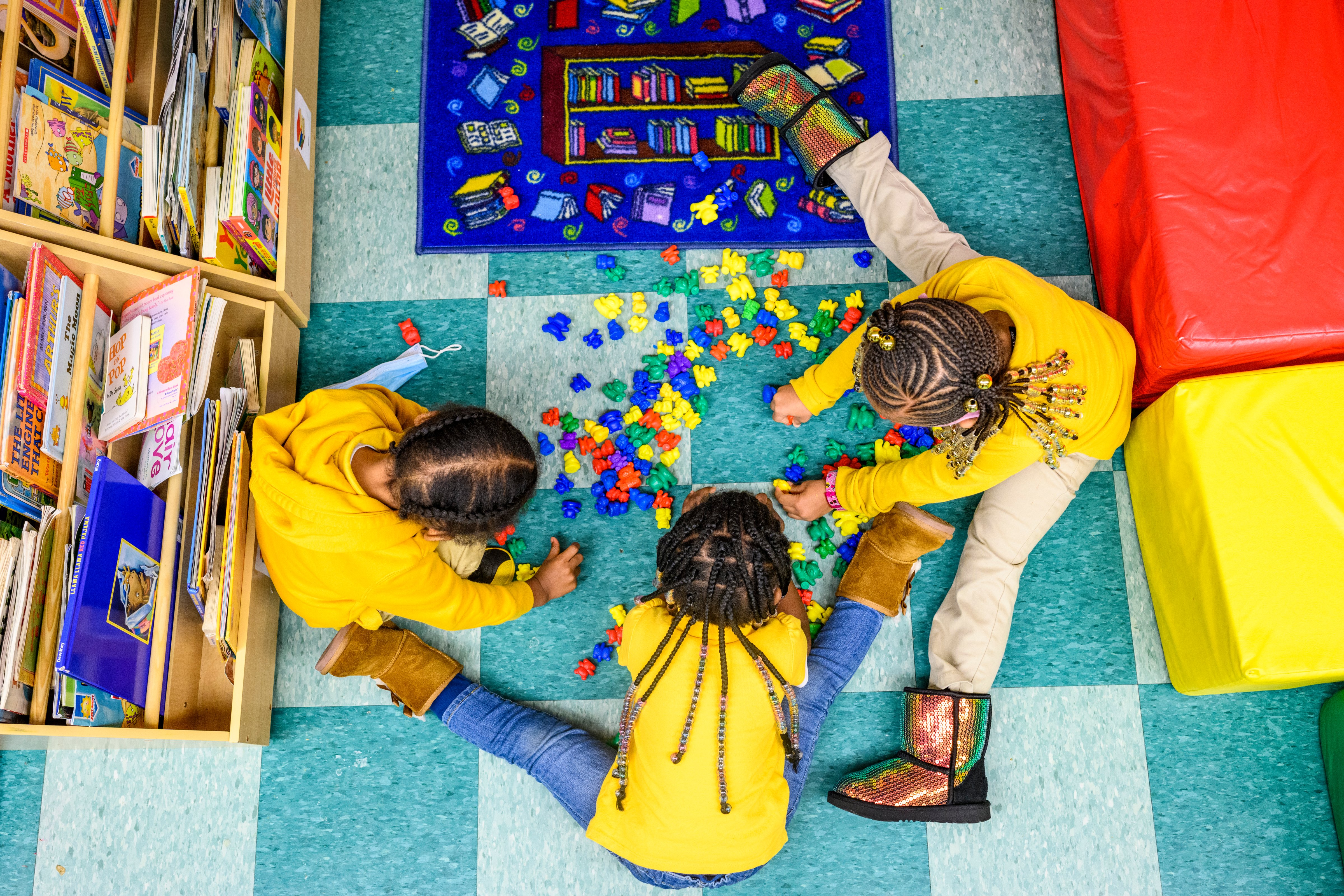 Children play in a three-year-olds' class at Little Flowers Early Childhood and Development Center located in Baltimore, Maryland, on January 11, 2021. (Photo by Matt Roth for The Washington Post via Getty Images)