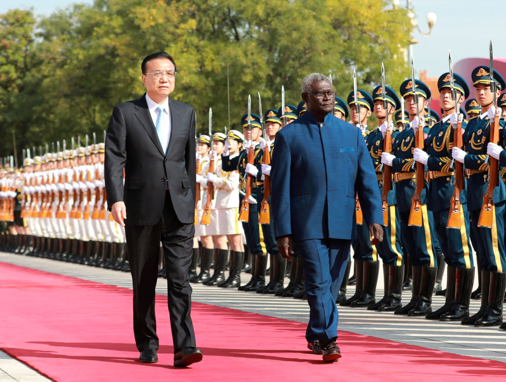 Chinese Premier Li Keqiang holds a welcoming ceremony for Solomon Islands' Prime Minister Manasseh Sogavare ahead of their talks at the Great Hall of the People in Beijing, capital of China, Oct. 9, 2019. Sogavare is paying an official visit to China.