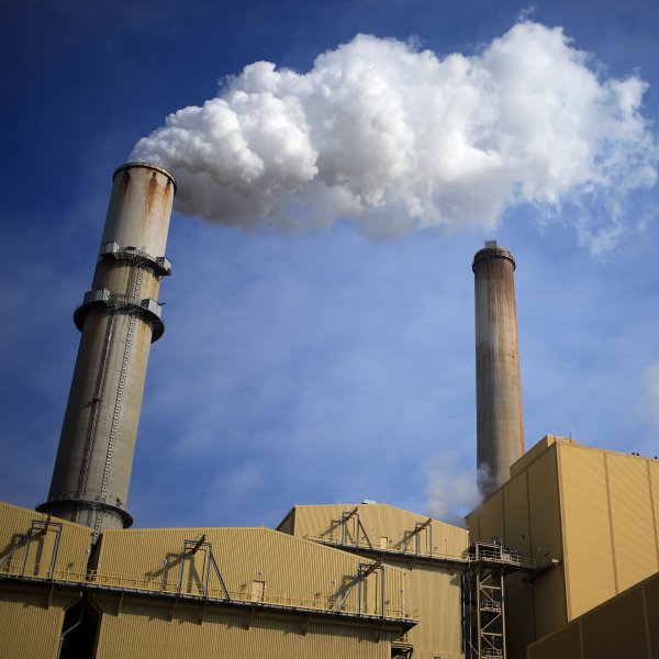 Emissions rise from the Kentucky Utilities Co. Ghent generating station in Ghent, Kentucky, on April 6, 2021.