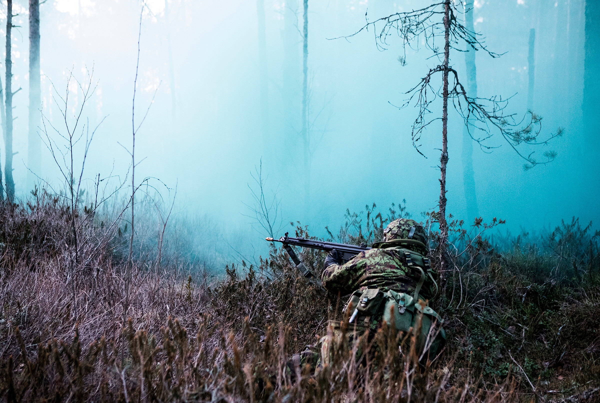 A member of the Estonian Defense League in the forests of Klooga, Estonia on March 27. (Birgit Püve for TIME)