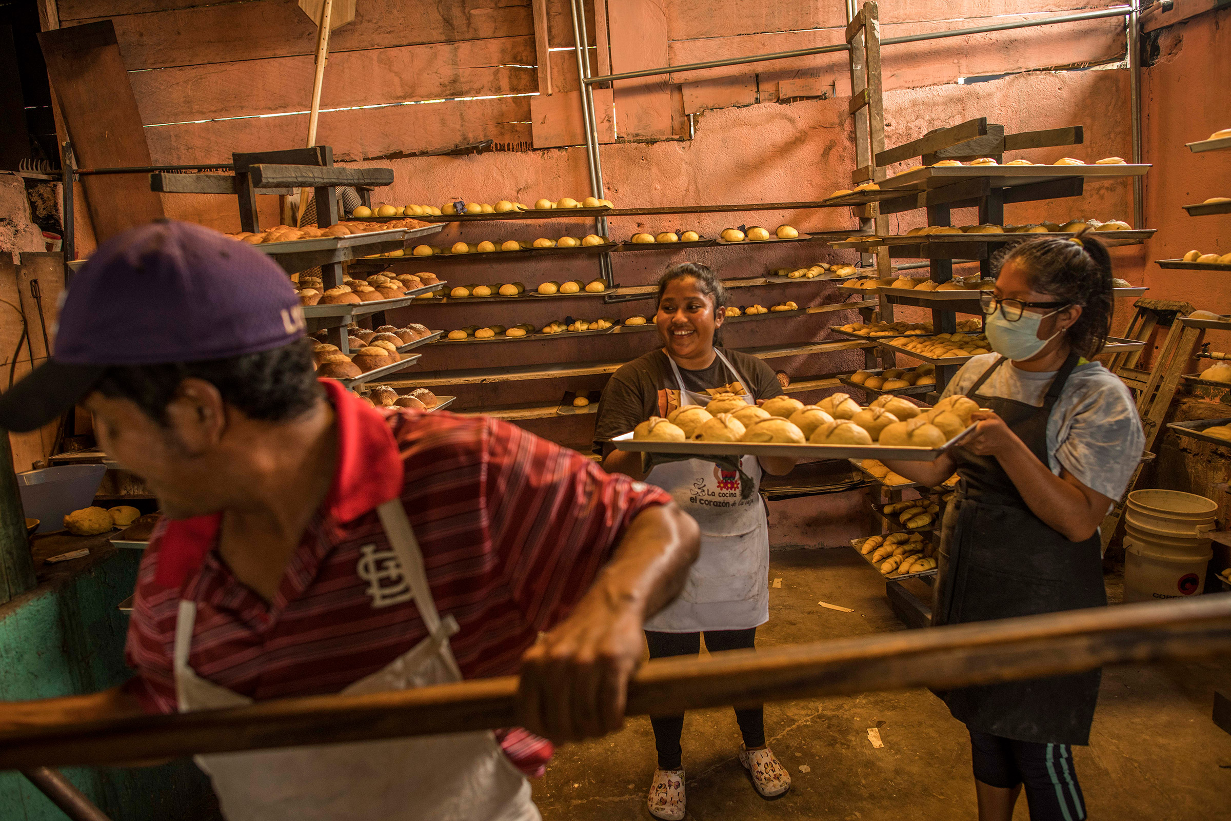 Bakery of Amelia Ixcoy, 56 (not pictured), who is Letty Baran's step sister, founder of the cooperative. This business was supported economically by the cooperative.El Palmar, Quetzaltenango, Guatemala. April 9, 2022.Around 35 residents of El Palmar, who have relative in the US, establish a cooperative in order to help their family with loans and training to start and support local business. The co-op holds around 500,000 quetzales—around $65,000—and has so far invested in ten of its members’ new businesses, including a baker, mobile phones repair shop, a restaurant.