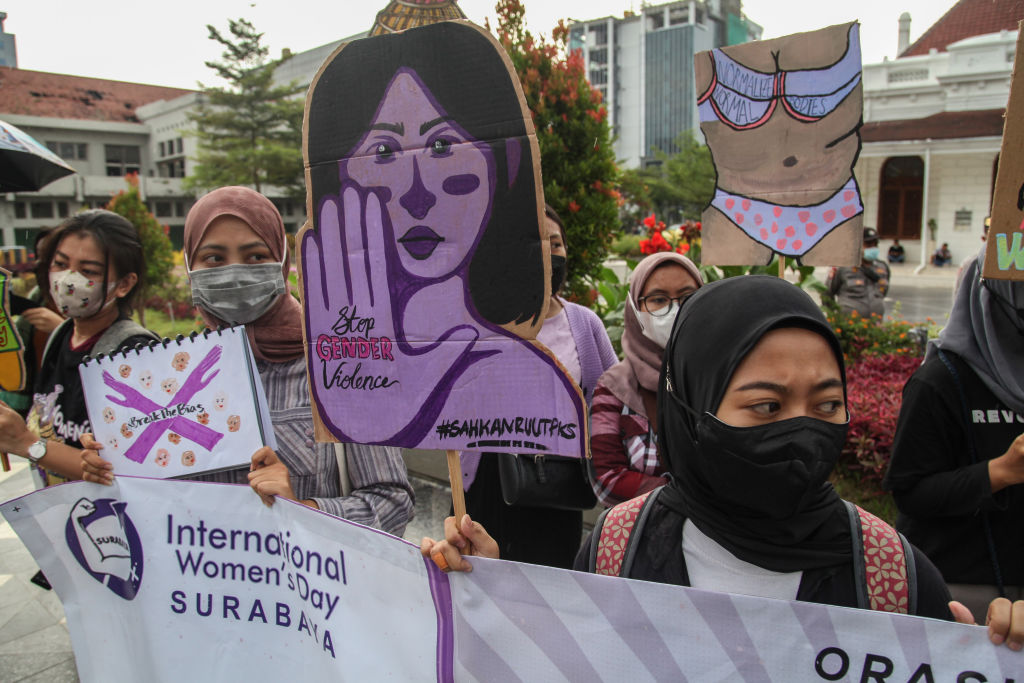 Activists hold an International Women's Day protest in Surabaya, East Java, on March 8, 2022. They called for gender equality and resistance to exploitation and sexual violence against women. (Suryanto–Anadolu Agency/Getty Images)