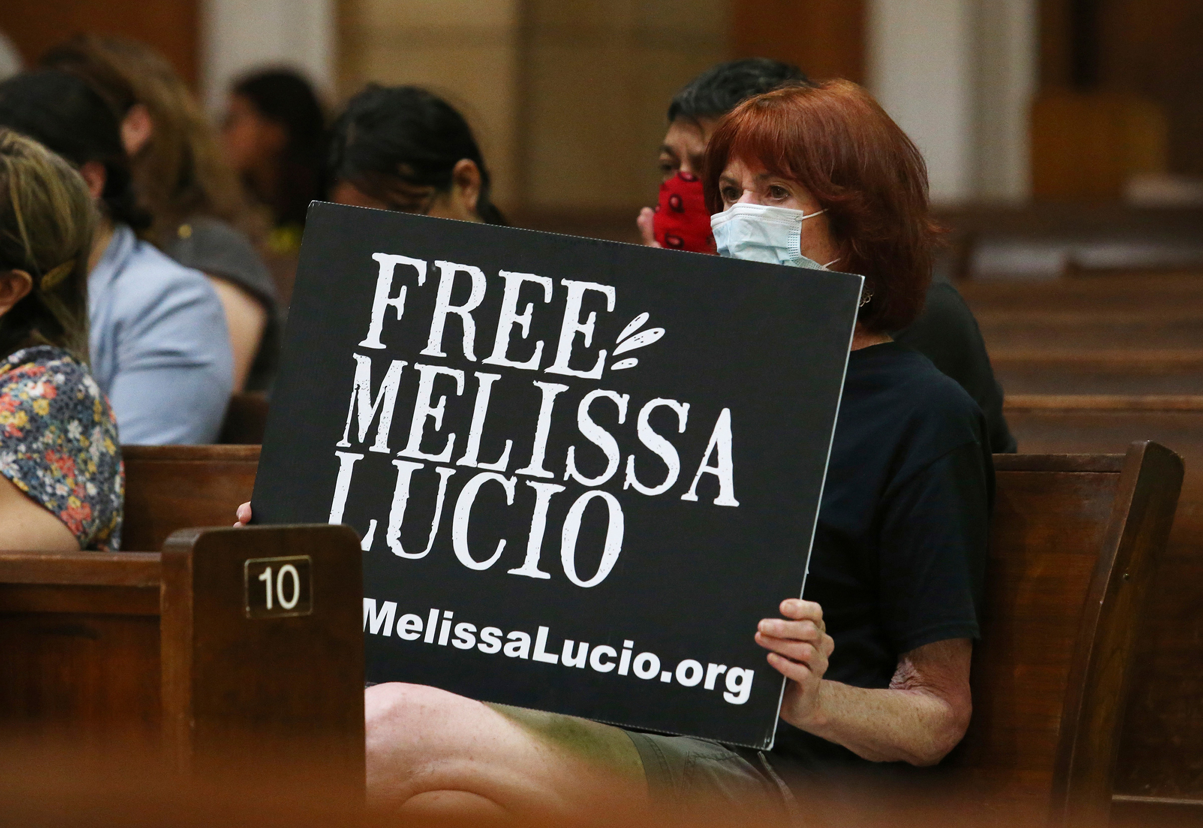 Rachelle Zoca attend a vigil for Melissa Lucio at the Basilica Of Our Lady of San Juan del Valle National Shrine in San Juan, Texas, on April 22, 2022.
