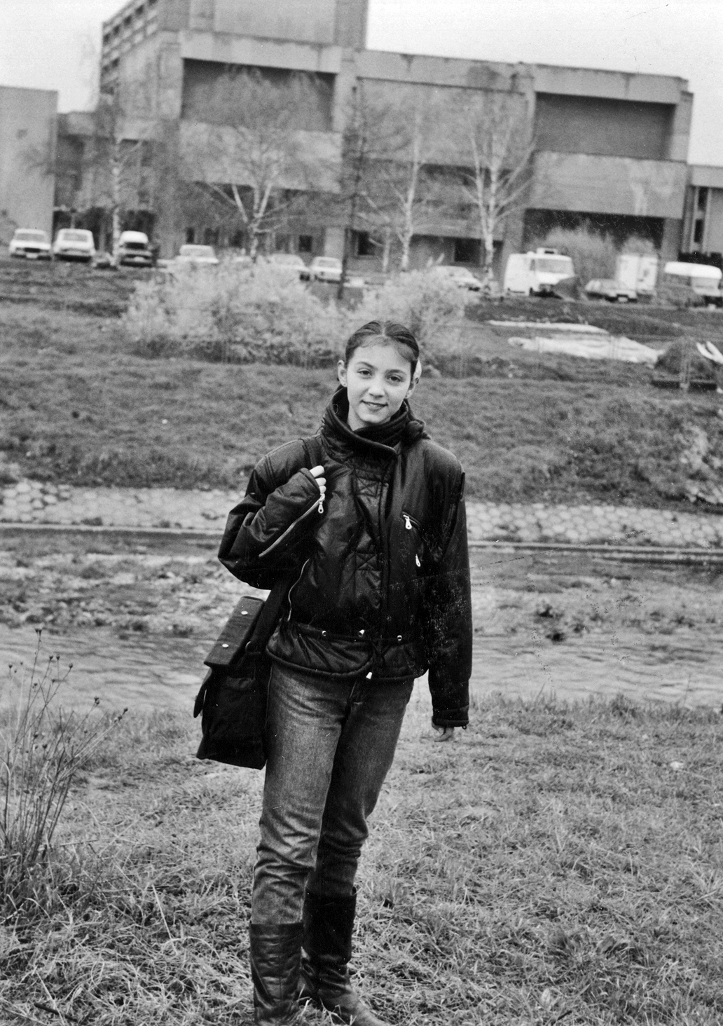 Nadja, at age 14, standing in front of the National Radio TV Station in Sarajevo.