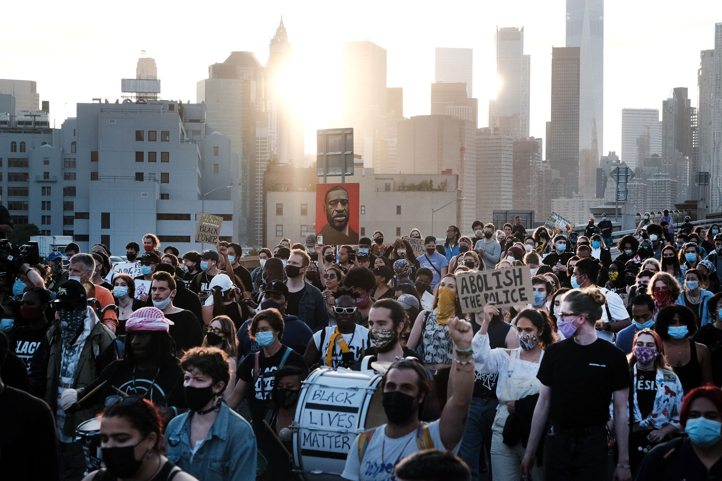 Black Lives Matter supporters and others march across the Brooklyn Bridge to honor George Floyd on the one year anniversary of his death on May 25, 2021. (Spencer Platt—Getty Images)
