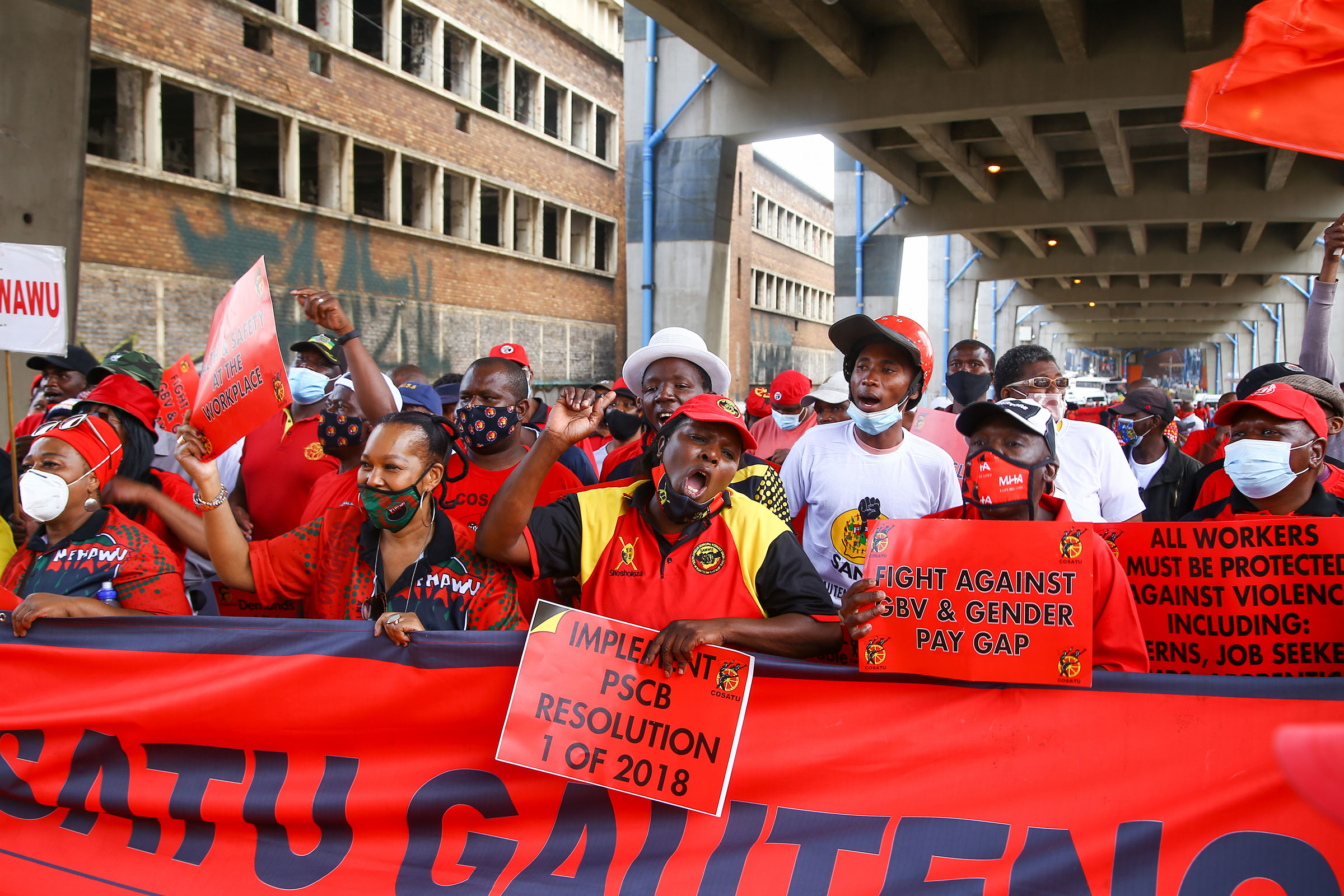 COSATU members during the Congress of South African Trade Unions (COSATU) National Day of Action at Mary Fitzgerald Square in Johannesburg, South Africa on Oct. 07, 2021. (Luba Lesolle—Gallo Images/Getty Images)
