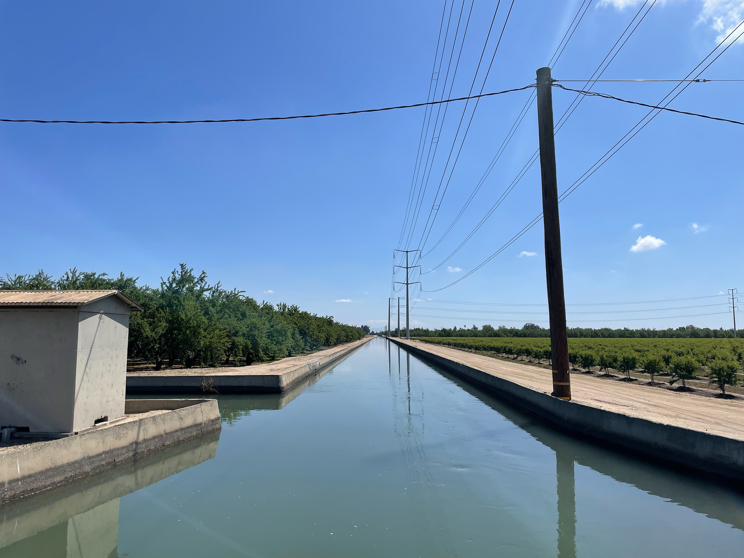 Narrow canal at site proposed for prototype in the Turlock Irrigation district.