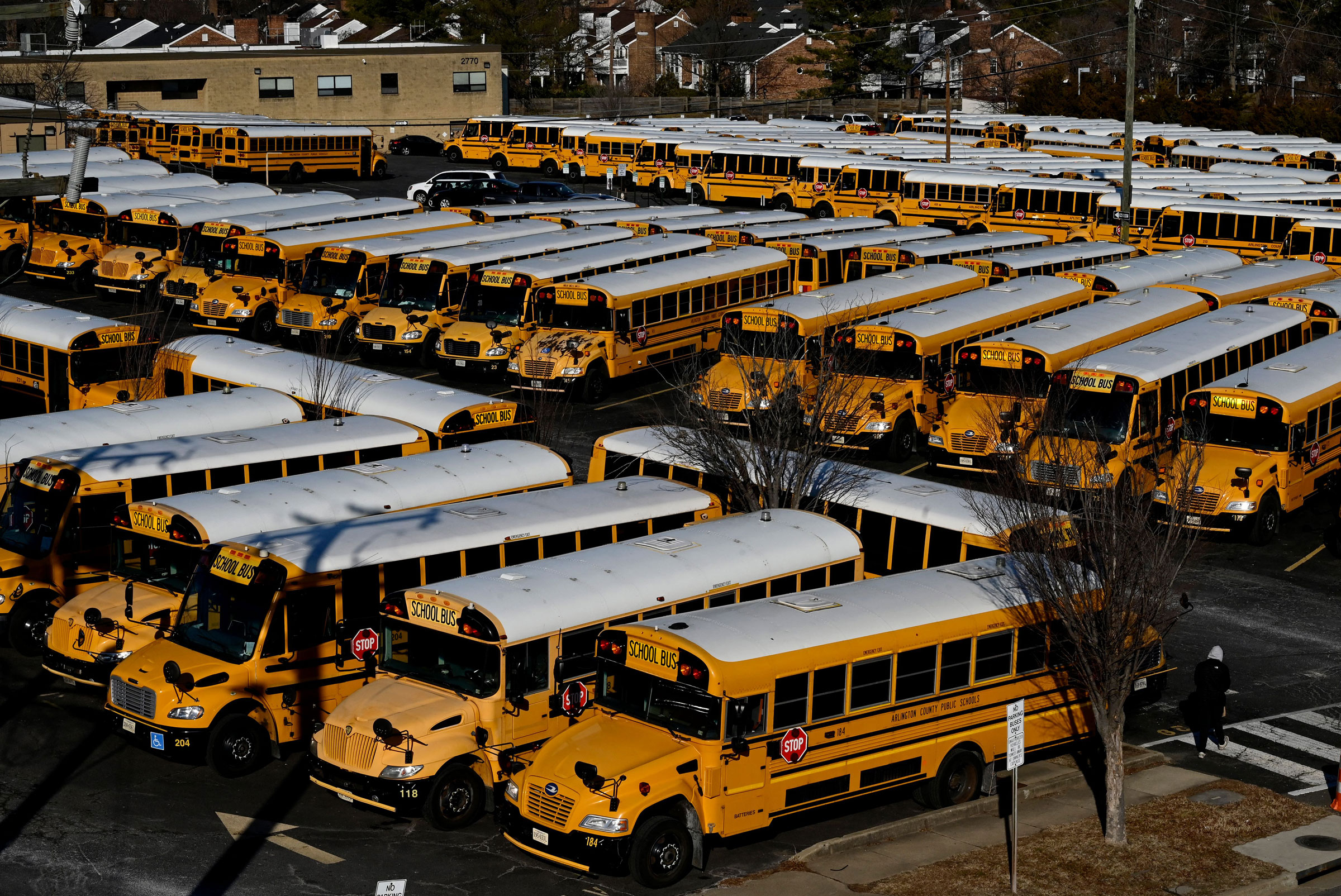 School buses are parked at the Arlington County Bus Depot