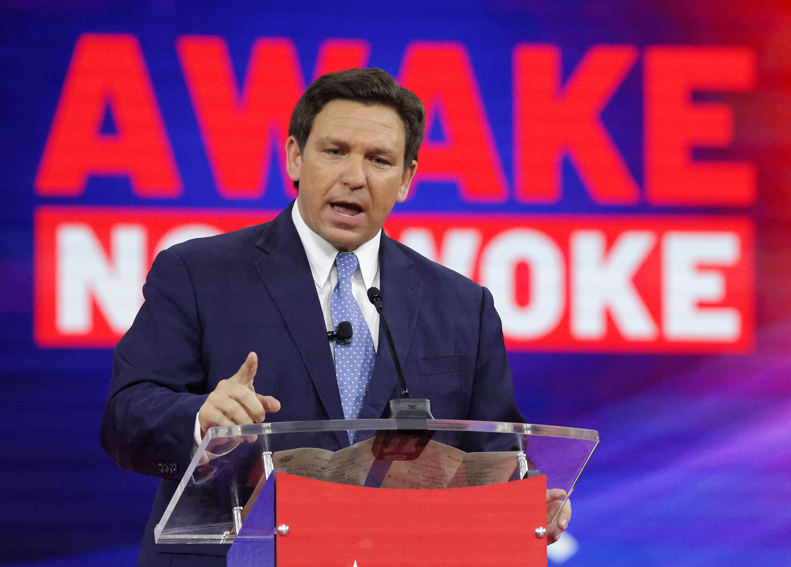 Florida Gov. Ron DeSantis delivers remarks at the 2022 CPAC conference in Orlando, Fla., on Feb. 24, 2022. (Joe Burbank—Orlando Sentinel/Getty Images)
