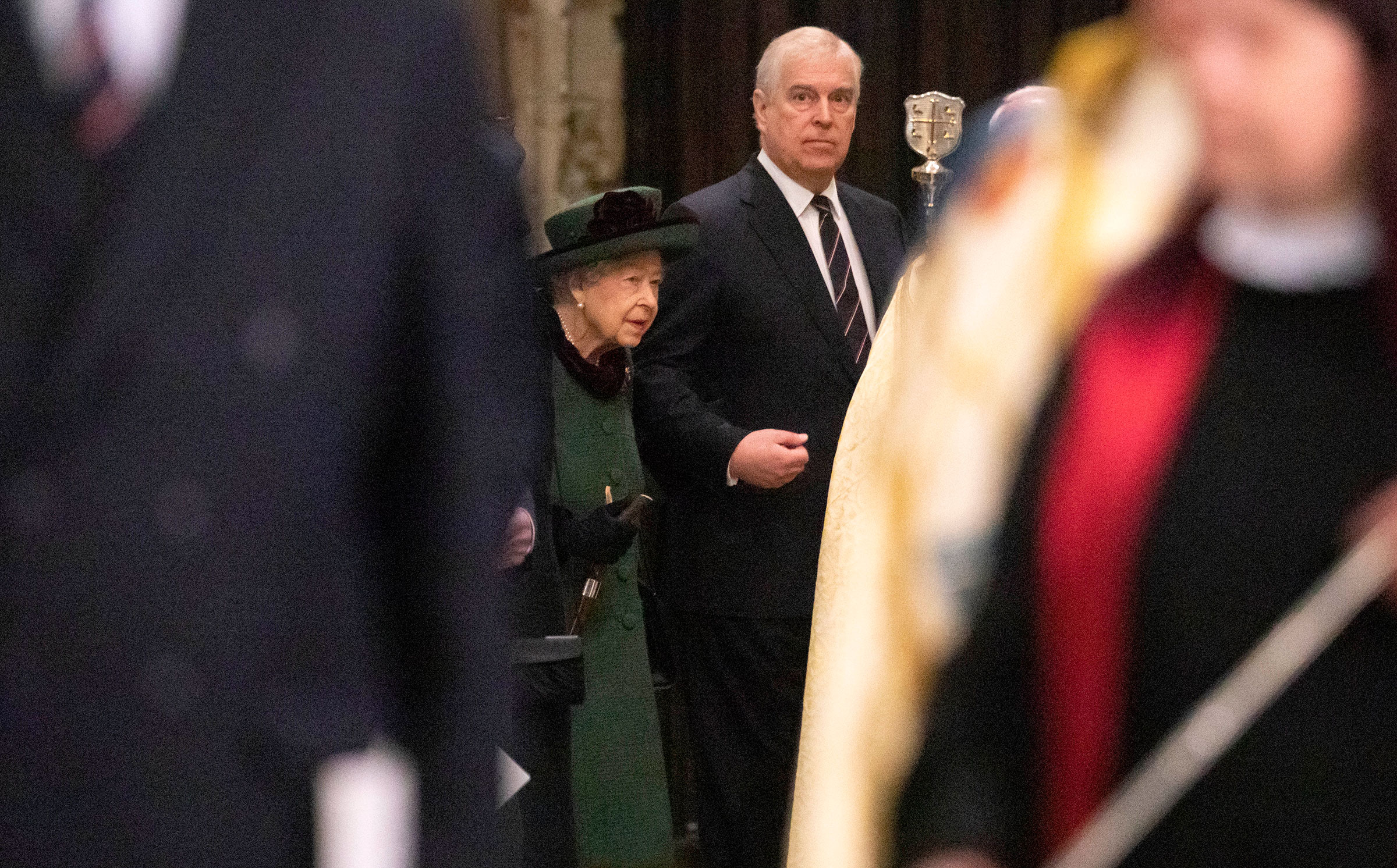 Queen Elizabeth II arrives in Westminster Abbey accompanied by Prince Andrew, Duke of York for the Service Of Thanksgiving For The Duke Of Edinburgh on March 29, 2022 in London. (Richard Pohle—WPA Pool/Getty Images)