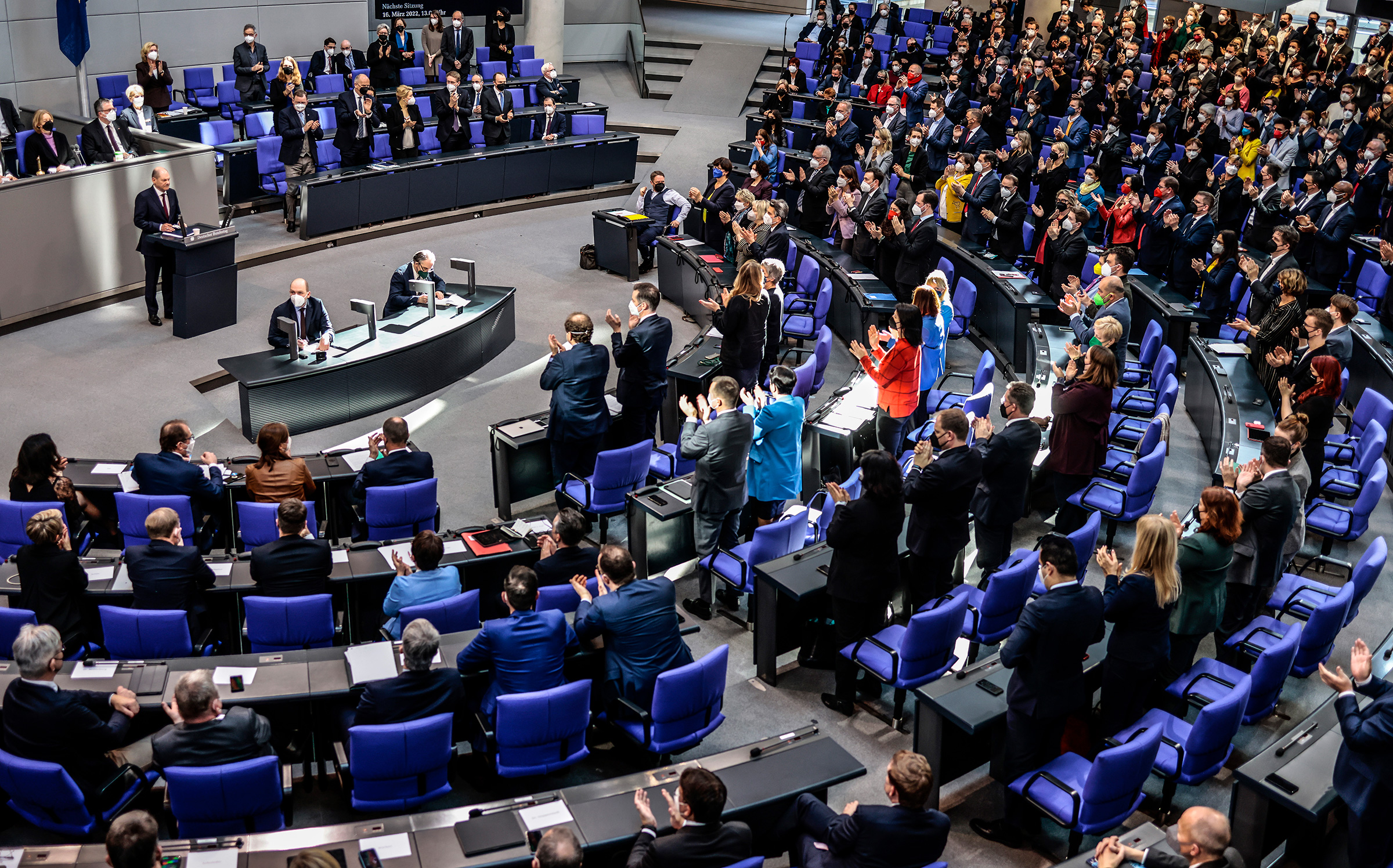 Scholz receives a standing ovation after his speech to the German Parliament on Feb. 27 (Hannibal Hanschke—Getty Images)