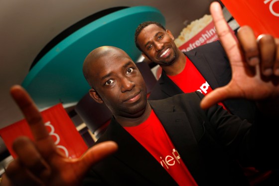 MoviePass co-founders Stacy Spikes (front) and Hamet Watt (back) at AMC in San Francisco, Calif., on Wednesday, January 29, 2011. MoviePass is a new mobile service that lets people go to as many movies as they want for $50 a month. They use their phone a