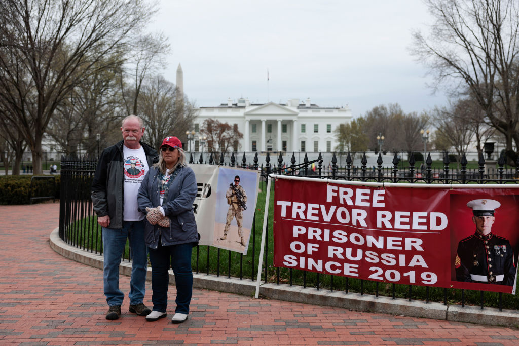 Joey Reed and Paula Reed, the parents of Trevor Reed, a U.S. Marine who was detained in a Russian prison, demonstrate in Lafayette Park near the White House on March 30, 2022, in Washington, D.C. (Anna Moneymaker—Getty Images)