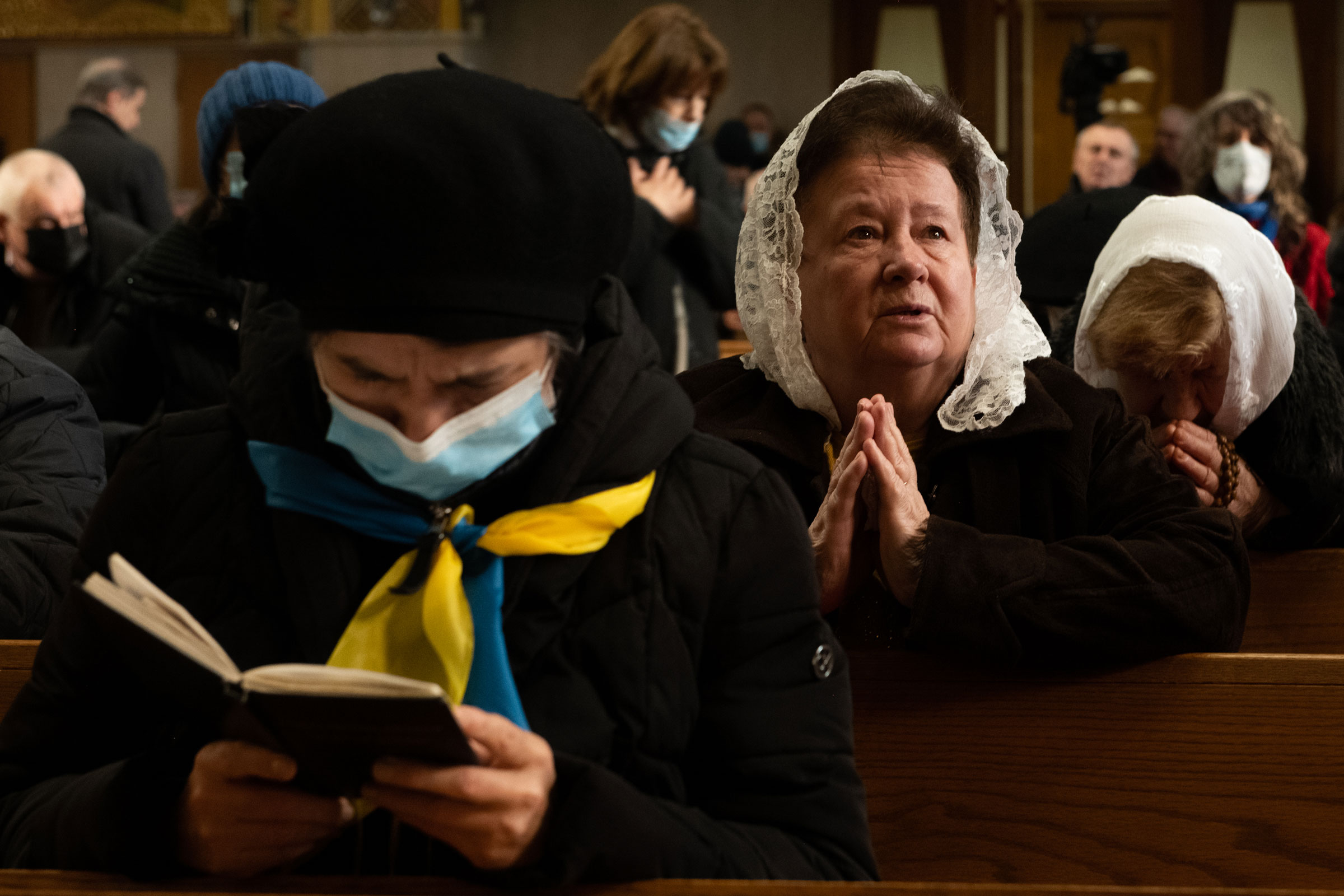 A woman prays at mass at St. George’s Church on February 27, 2022 in New York City. (Alexi Rosenfeld—Getty Images)