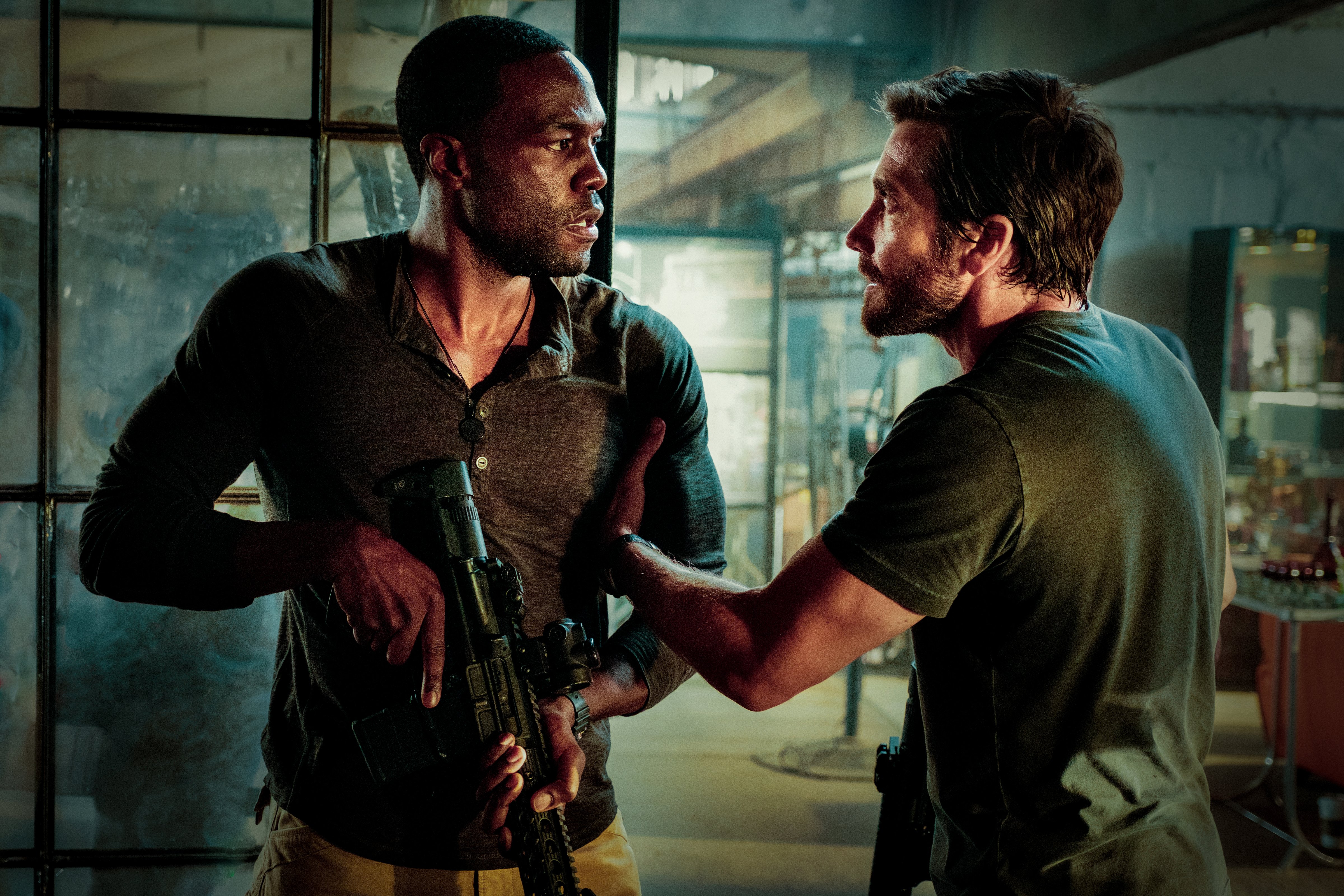 (L-R) Yahya Abdul-Mateen II and Jake Gyllenhaal in Michael Bay's <i>Ambulance</i> (Andrew Cooper—Universal Pictures)