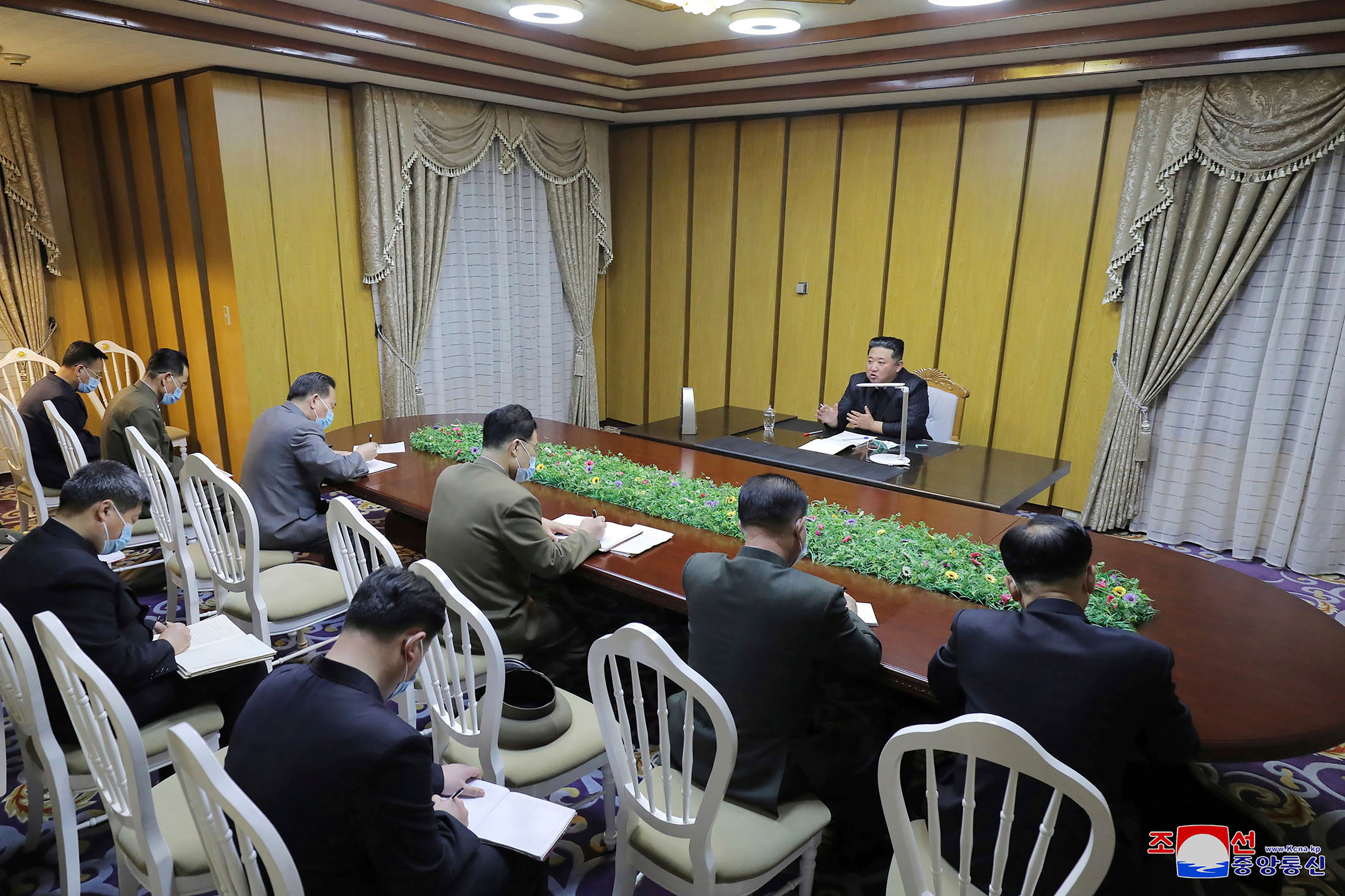 North Korean leader Kim Jong-un addresses officials at the state emergency epidemic prevention headquarters in North Korea May 12, 2022. (AP–Korean Central News Agency)