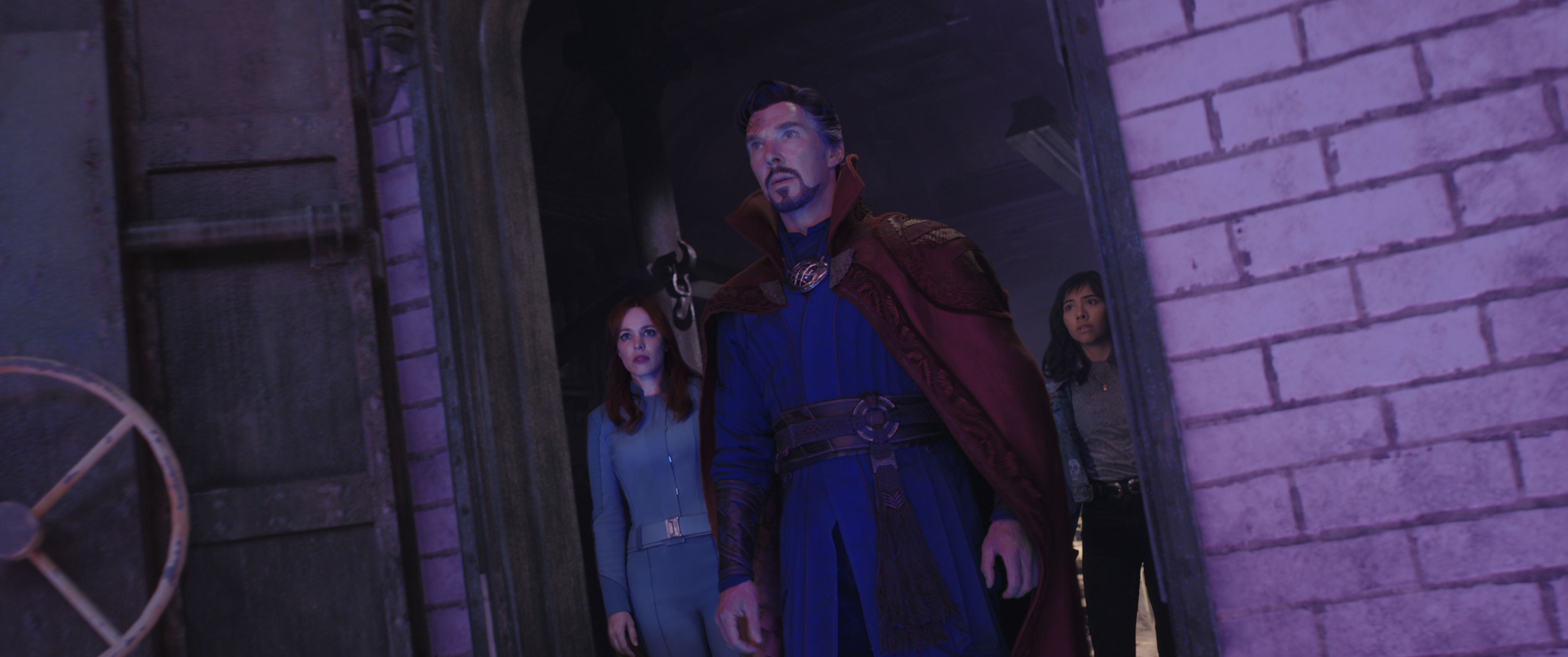 Rachel McAdams as Dr. Christine Palmer, Benedict Cumberbatch as Dr. Stephen Strange, and Xochitl Gomez as America Chavez in DOCTOR STRANGE IN THE MULTIVERSE OF MADNESS. (Courtesy of Marvel Studios)