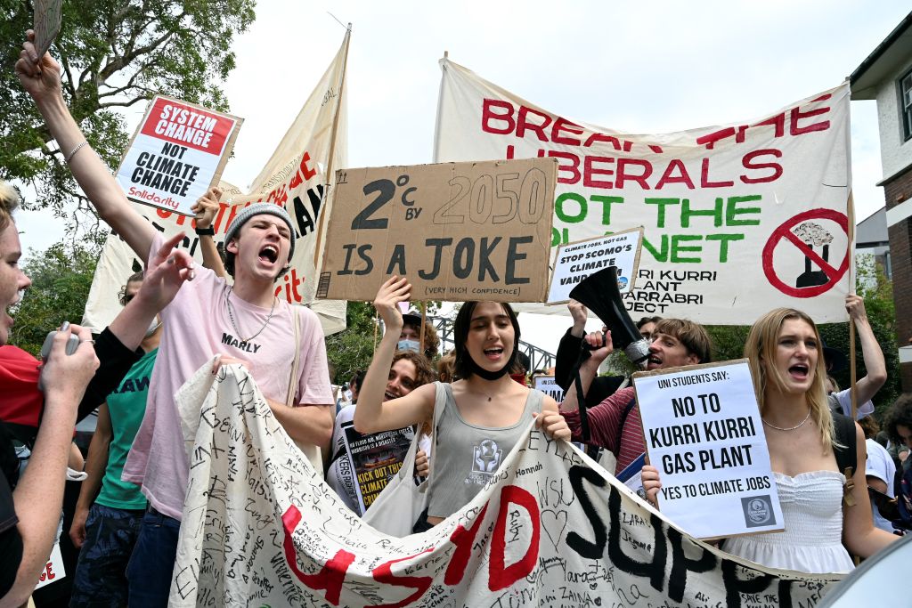 Students in Sydney on March 25, 2022, during a protest highlighting inadequate progress to address climate change. ((Photo by Muhammad FAROOQ / AFP) (Photo by MUHAMMAD FAROOQ/AFP via Getty Images))
