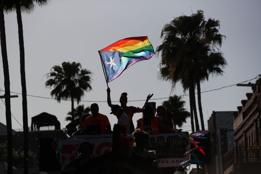 Revelers celebrate on 7th Avenue during the Tampa Pride Parade in the Ybor City neighborhood on March 26, 2022 in Tampa, Florida. The Tampa Pride was held in the wake of the passage of Florida's controversial "Don't Say Gay" Bill. (Octavio Jones-Getty Images)