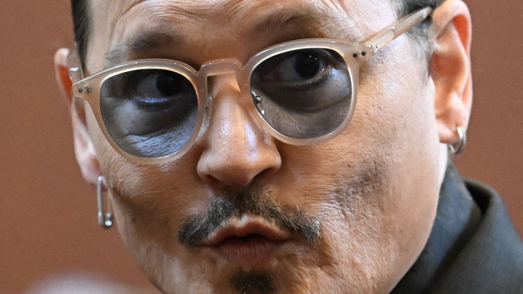 US actor Johnny Depp looks on during a hearing at the Fairfax County Circuit Courthouse in Fairfax, Virginia, on May 3, 2022. (Jim Watson—Getty Images)