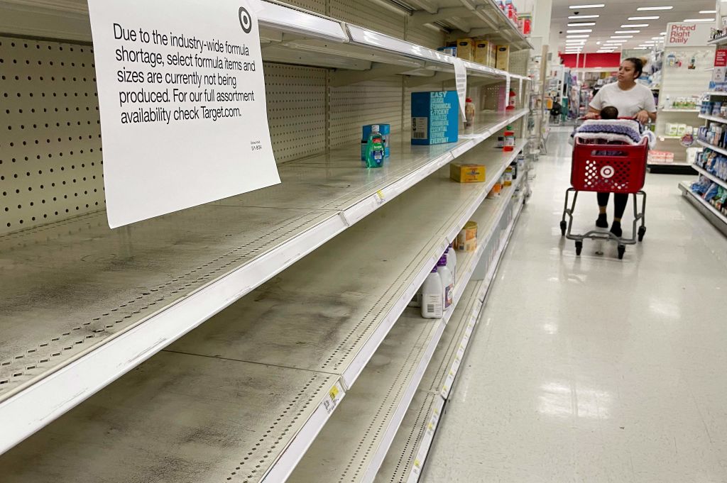 A woman shops for baby formula at Target in Annapolis, Maryland, on May 16, 2022, as a nationwide shortage of baby formula continues. (Photo by JIM WATSON/AFP via Getty Images)