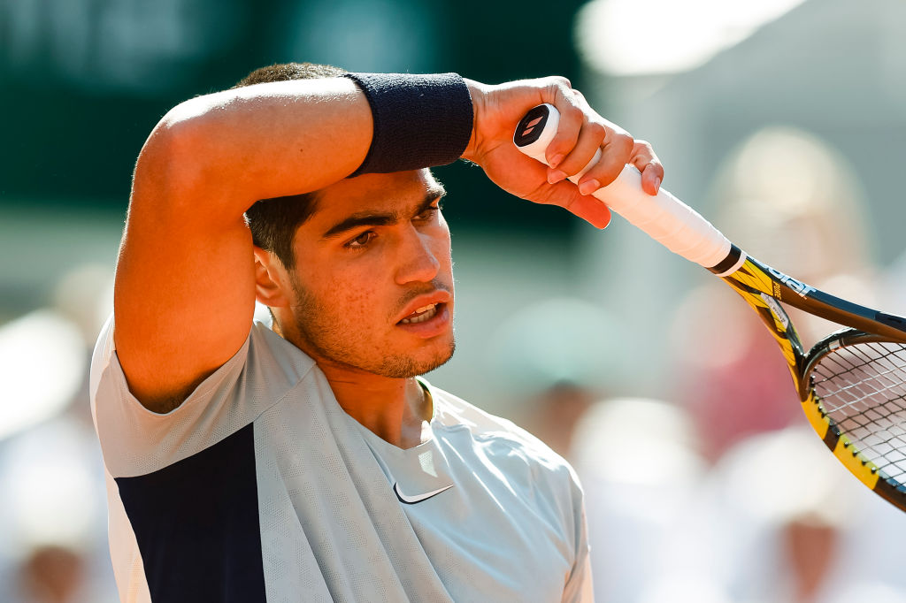 Carlos Alcaraz of Spain reacts during his match against Alexander Zverev of Germany during the Men's Singles Quarter Finals match on Day 10 of the 2022 French Open at Roland-Garros on May 31, 2022 in Paris, France. (Antonio Borga/Eurasia Sport Images/Getty Images)