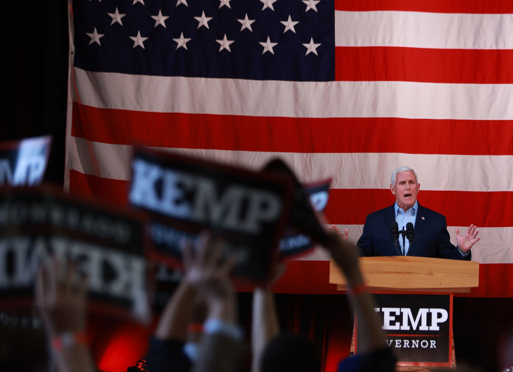 Former Vice President Mike Pence speaks at a campaign event for Georgia Gov. Brian Kemp at the Cobb County International Airport in Kennesaw, Ga. on May 23, 2022, the day before the state's primary. (Joe Raedle—Getty Images)