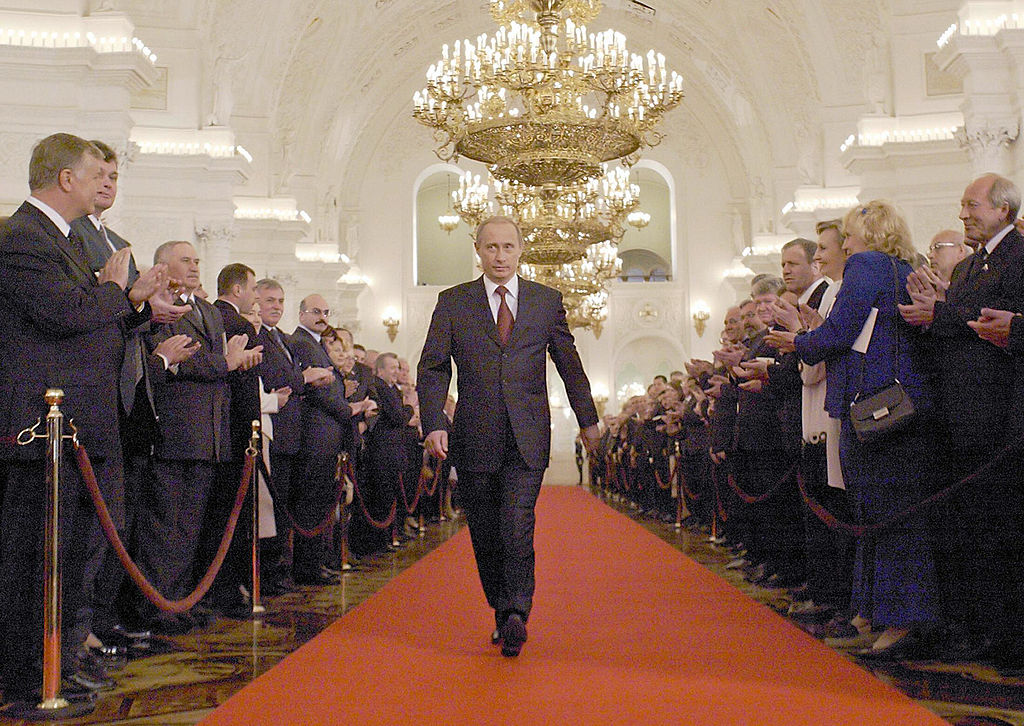 Russian President Vladimir Putin walks along St.George's Hall to take part in an inauguration ceremony in Moscow's Kremlin,  May 7, 2004. (Alexander Zemlianichenko—AFP/Getty Images)