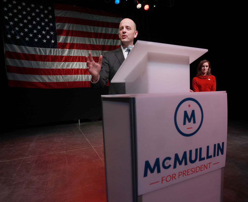 Independent 2016 presidential candidate Evan McMullin, speaks to supporters as his running mate Mindy Finn, (R) listens at an election night party  on November 8, 2016 in Salt Lake City, Utah. (Photo by George Frey/Getty Images)