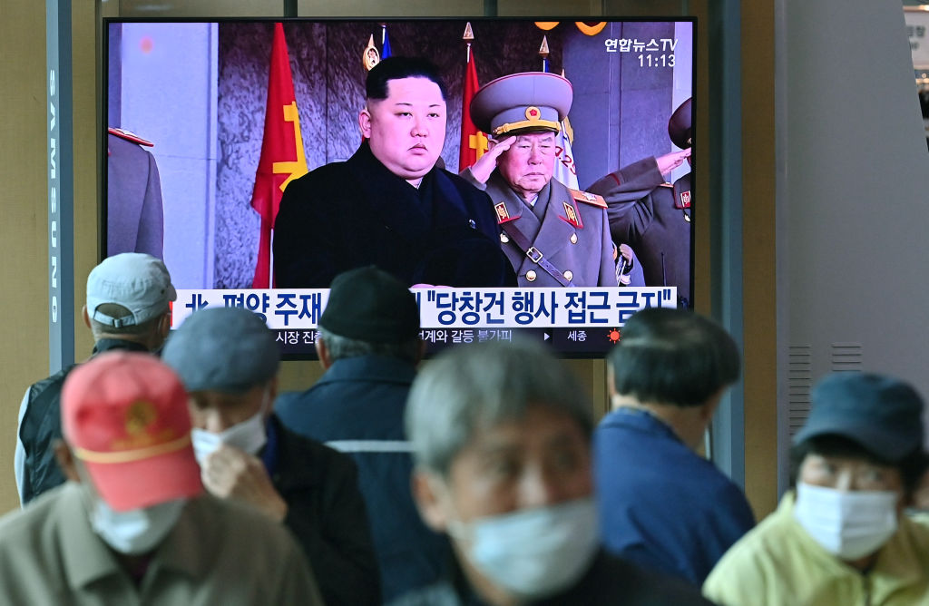 North Korea's leader Kim Jong Un looms on a public television at a railway station in Seoul, South Korea, on October 10, 2020. (Jung Yeon-Je—AFP/Getty Images)