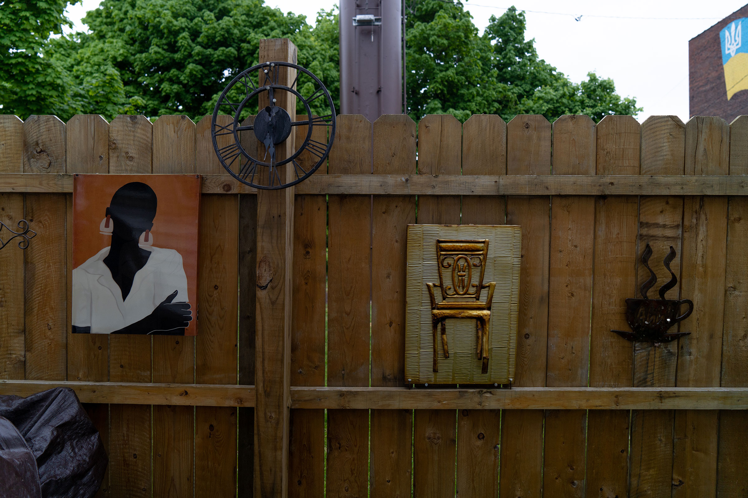 Farmhouse decorations on the fence of Katherine's home. (Joshua Thermidor for TIME)